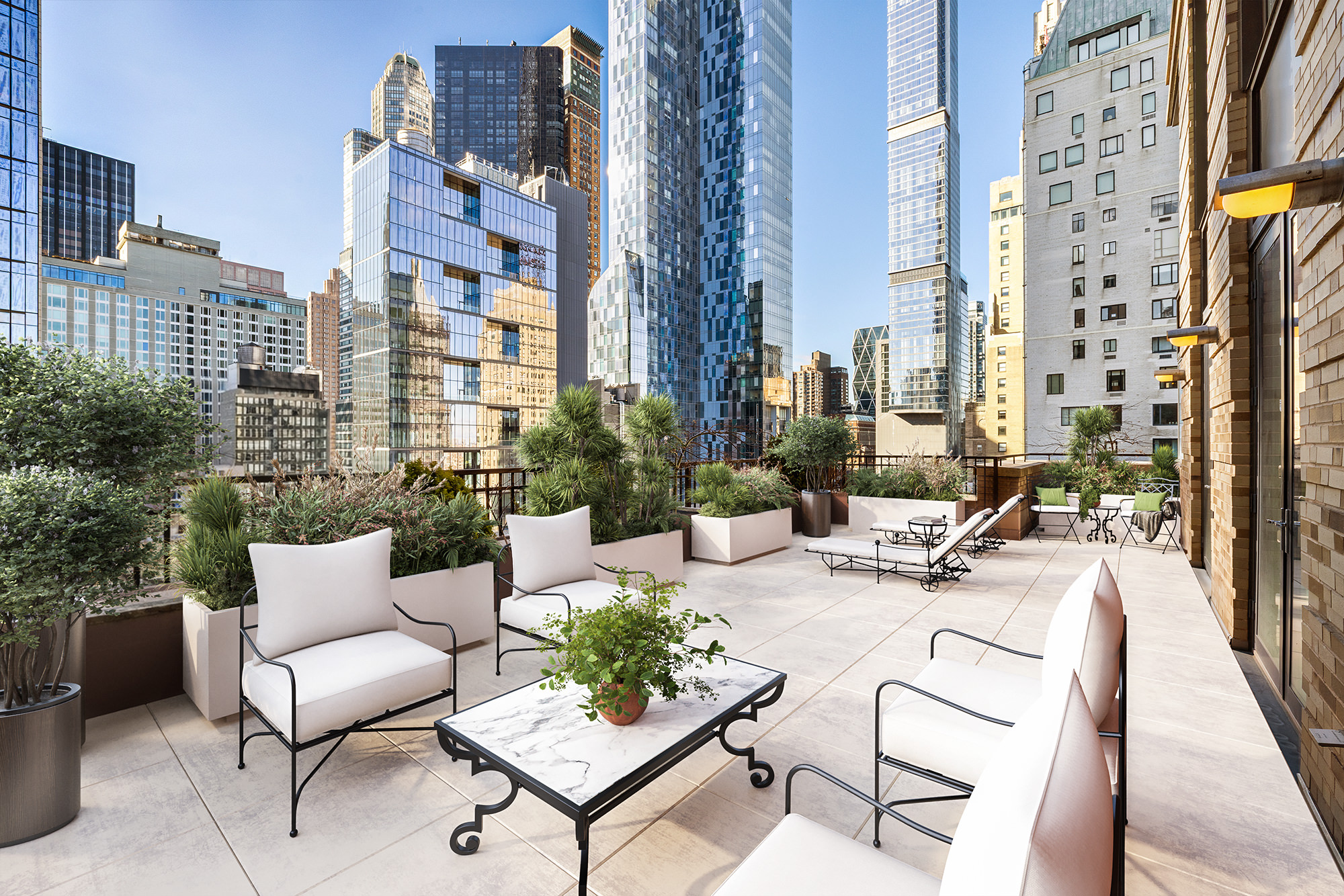 110 Central Park South, Unit PH1 Manhattan, NY 10019 - Photo 15 of 26 a view of a city with tall buildings