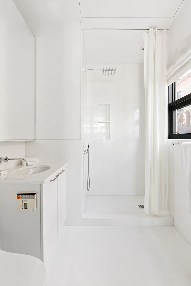 a bathroom with a sink and mirror