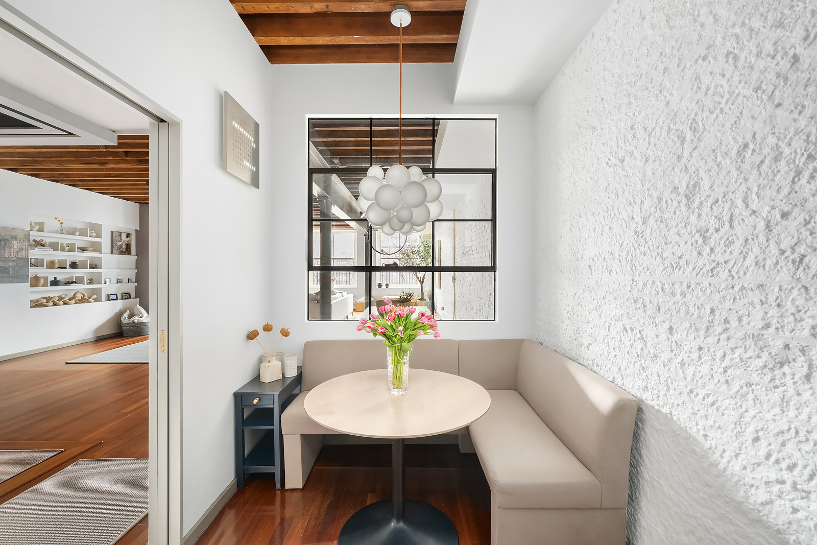 39 North Moore Street, Unit 4A Manhattan, NY 10013 - Photo 8 of 17 a view of a dining room with furniture window and outside view