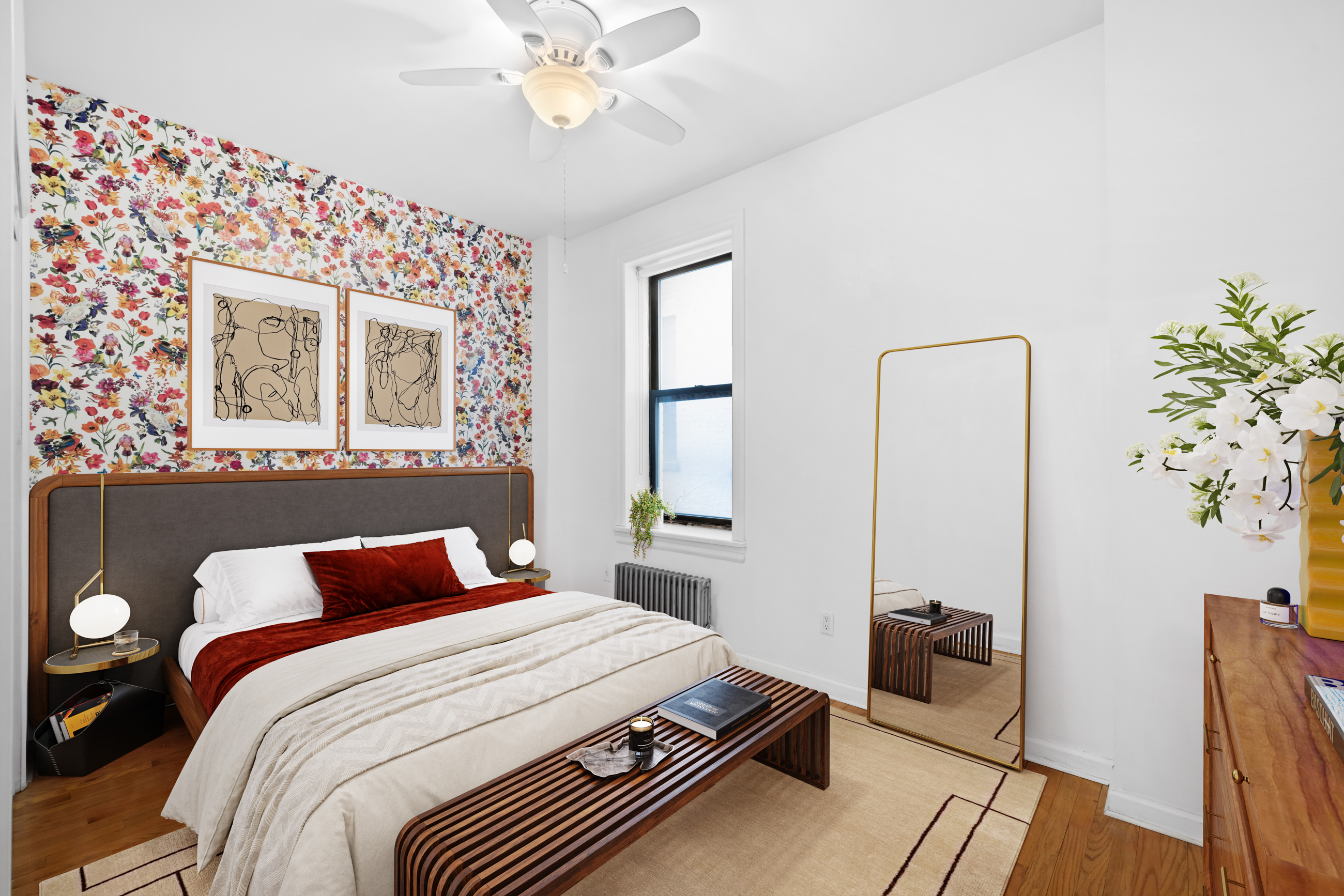 469 West 166th Street, Unit 2C Manhattan, NY 10032 - Photo 5 of 13 a bedroom with a bed and a chandelier