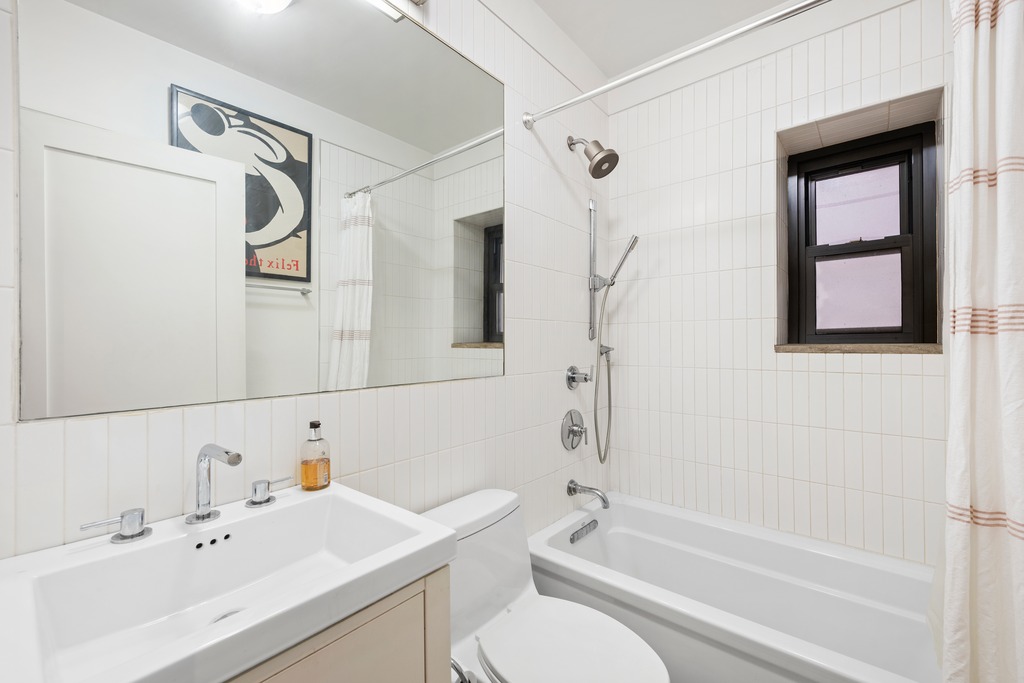 422 West 20th Street, Unit PARLOR H Manhattan, NY 10011 - Photo 6 of 16 a bathroom with a sink toilet and shower