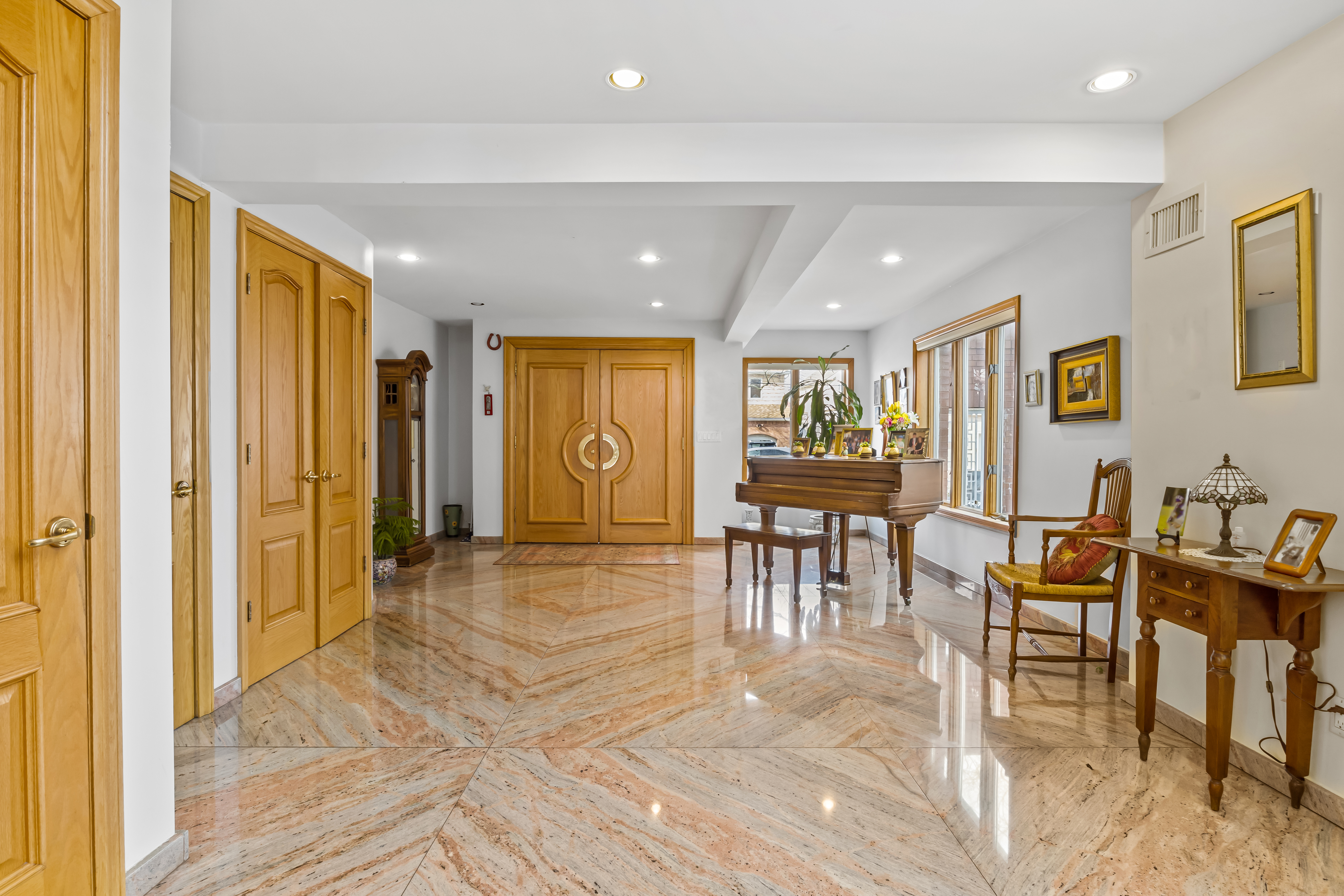 303 Whitman Drive Brooklyn, NY 11234 - Photo 10 of 37 a view of a livingroom with furniture and a table