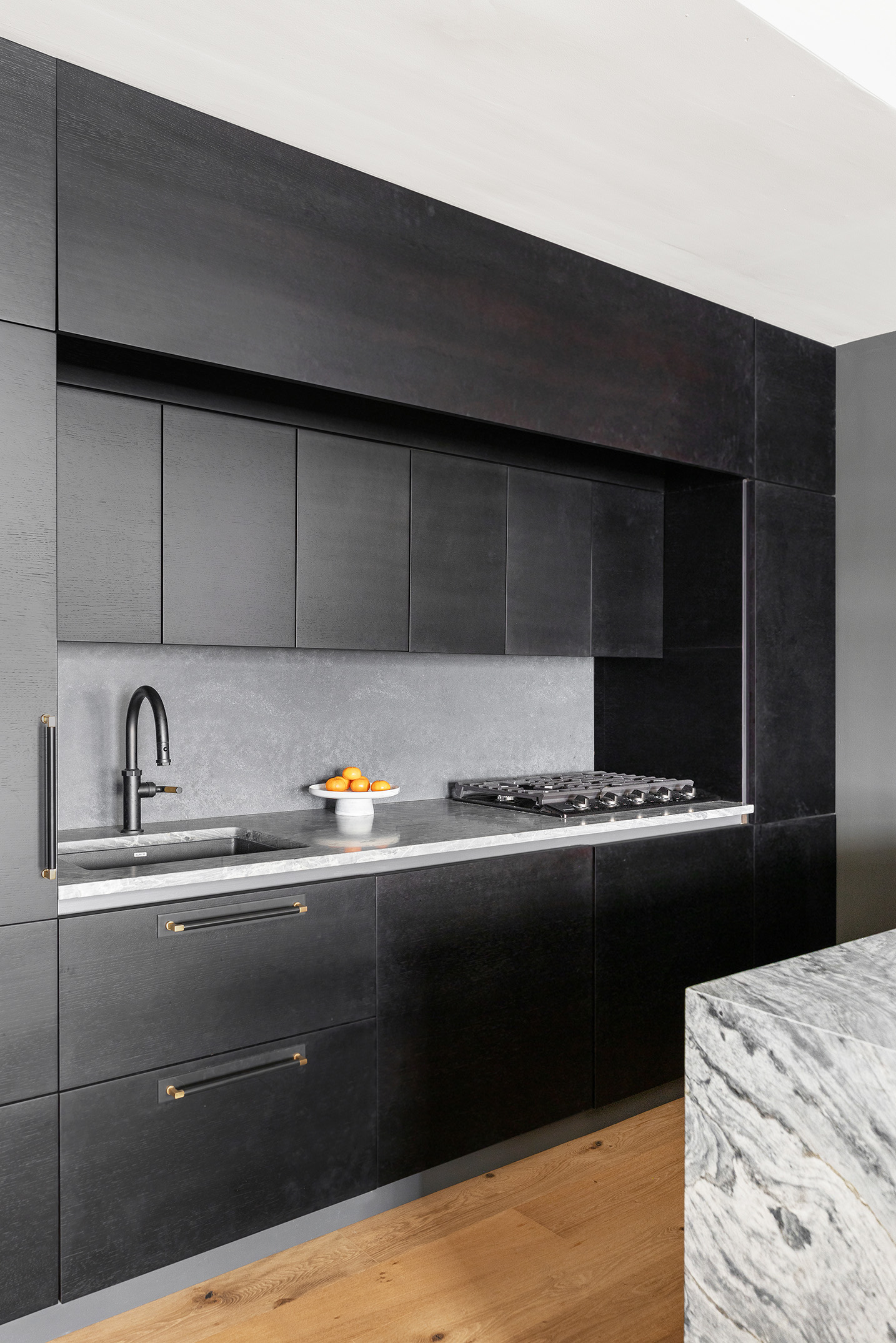 20 Pine Street, Unit 2408 Manhattan, NY 10005 - Photo 5 of 10 a kitchen with a sink and cabinets