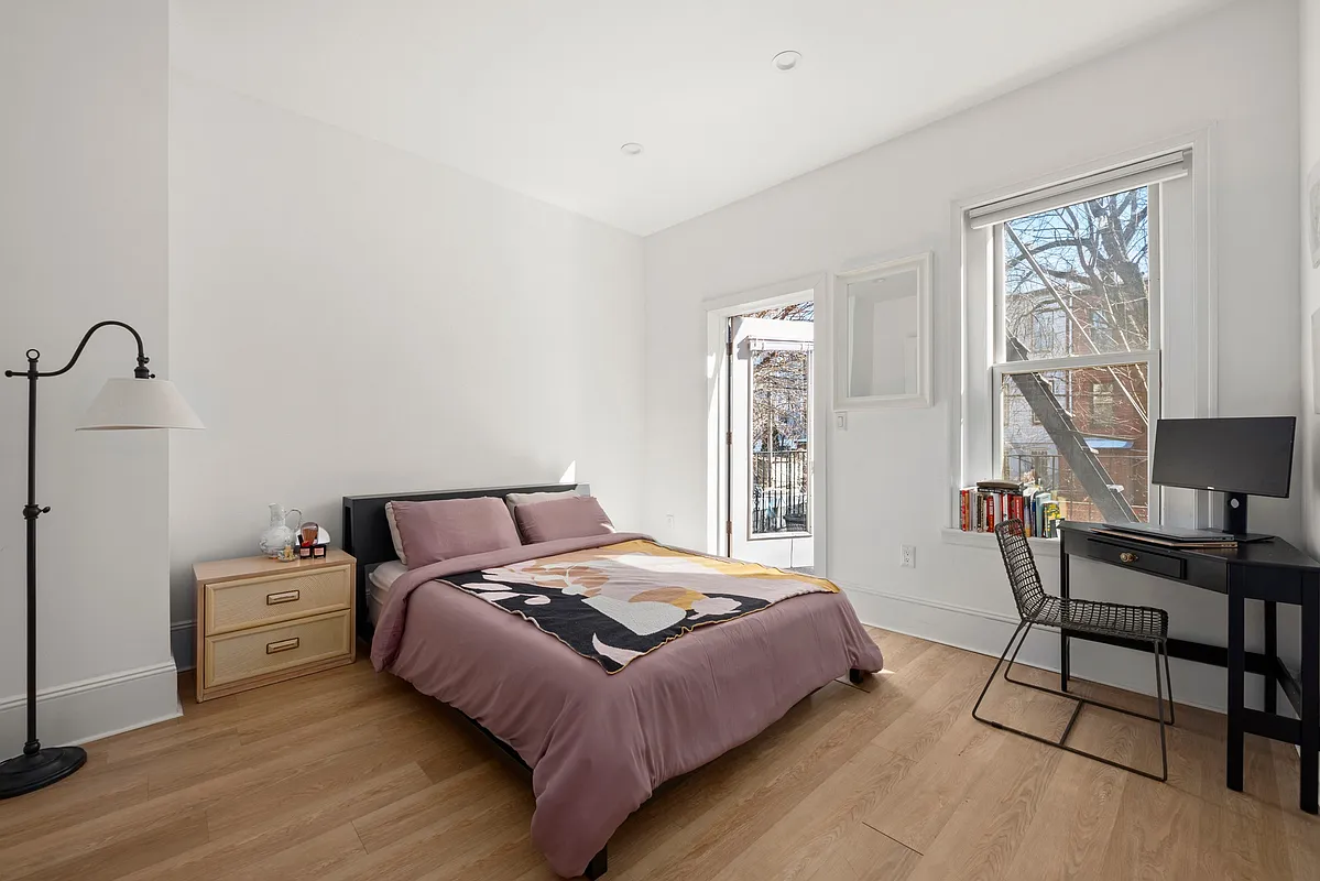1316 Jefferson Avenue, Unit 2 Brooklyn, NY 11221 - Photo 6 of 10 a bedroom with a bed and a window