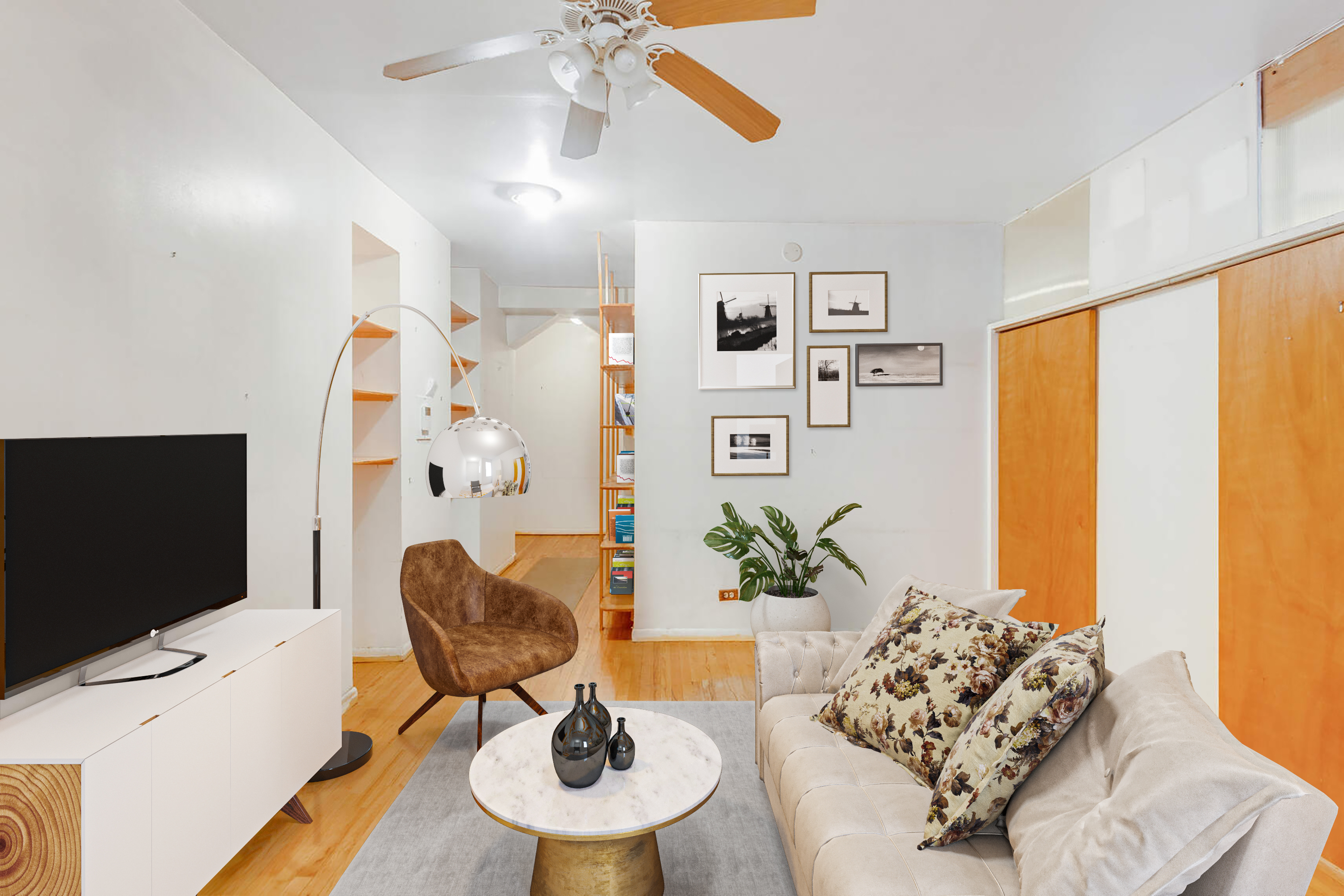 604 Riverside Drive, Unit 1B Manhattan, NY 10031 - Photo 3 of 14 a living room with furniture and a flat screen tv