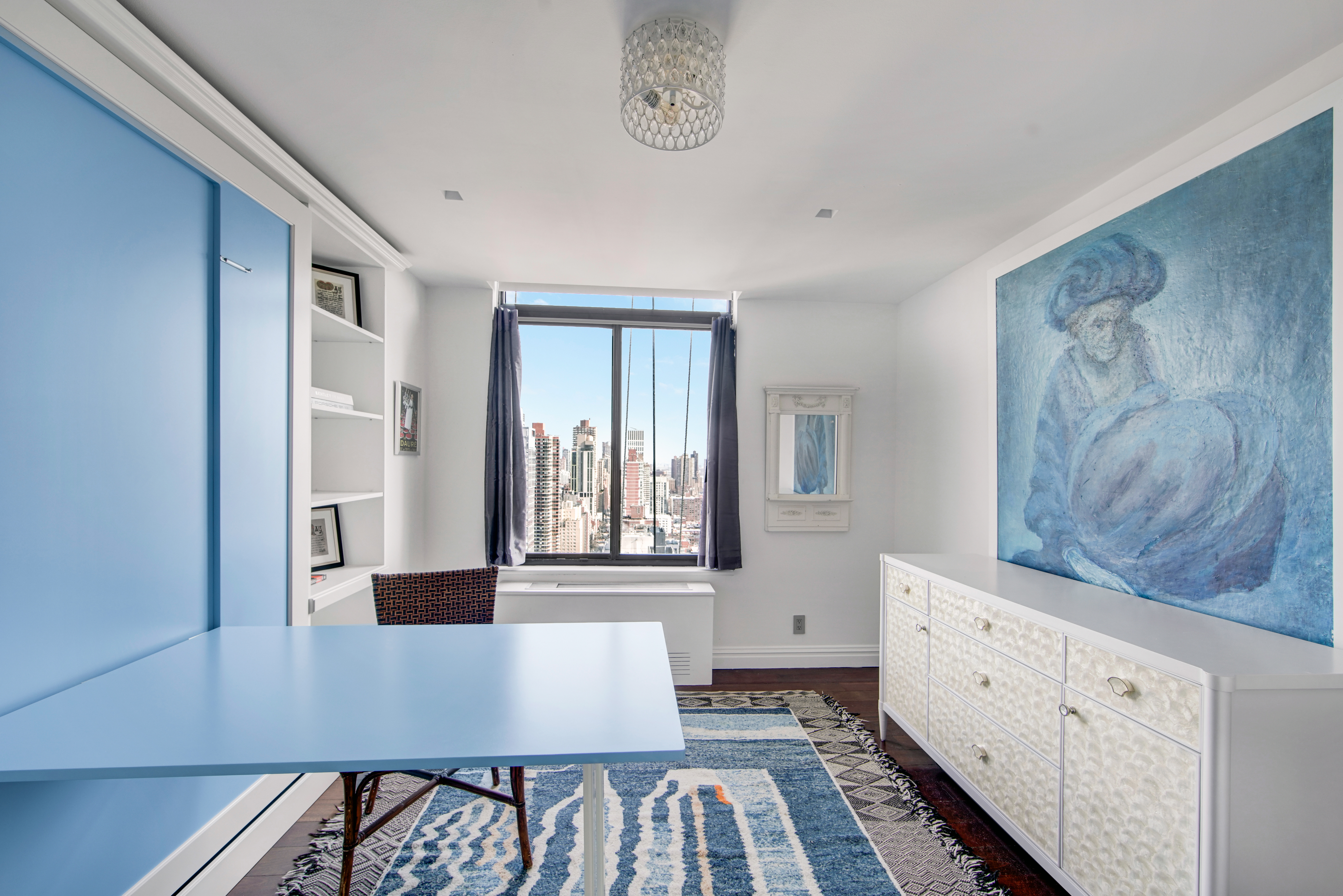 400 East 70th Street, Unit 3301 Manhattan, NY 10021 - Photo 11 of 20 a view of kitchen with furniture and window