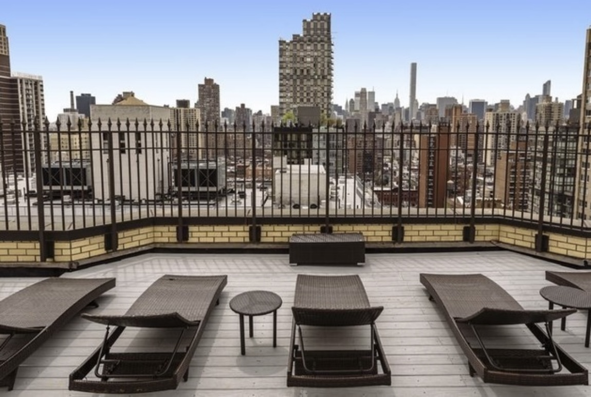301 East 87th Street, Unit 16E Manhattan, NY 10128 - Photo 14 of 16 a view of a terrace with sitting area