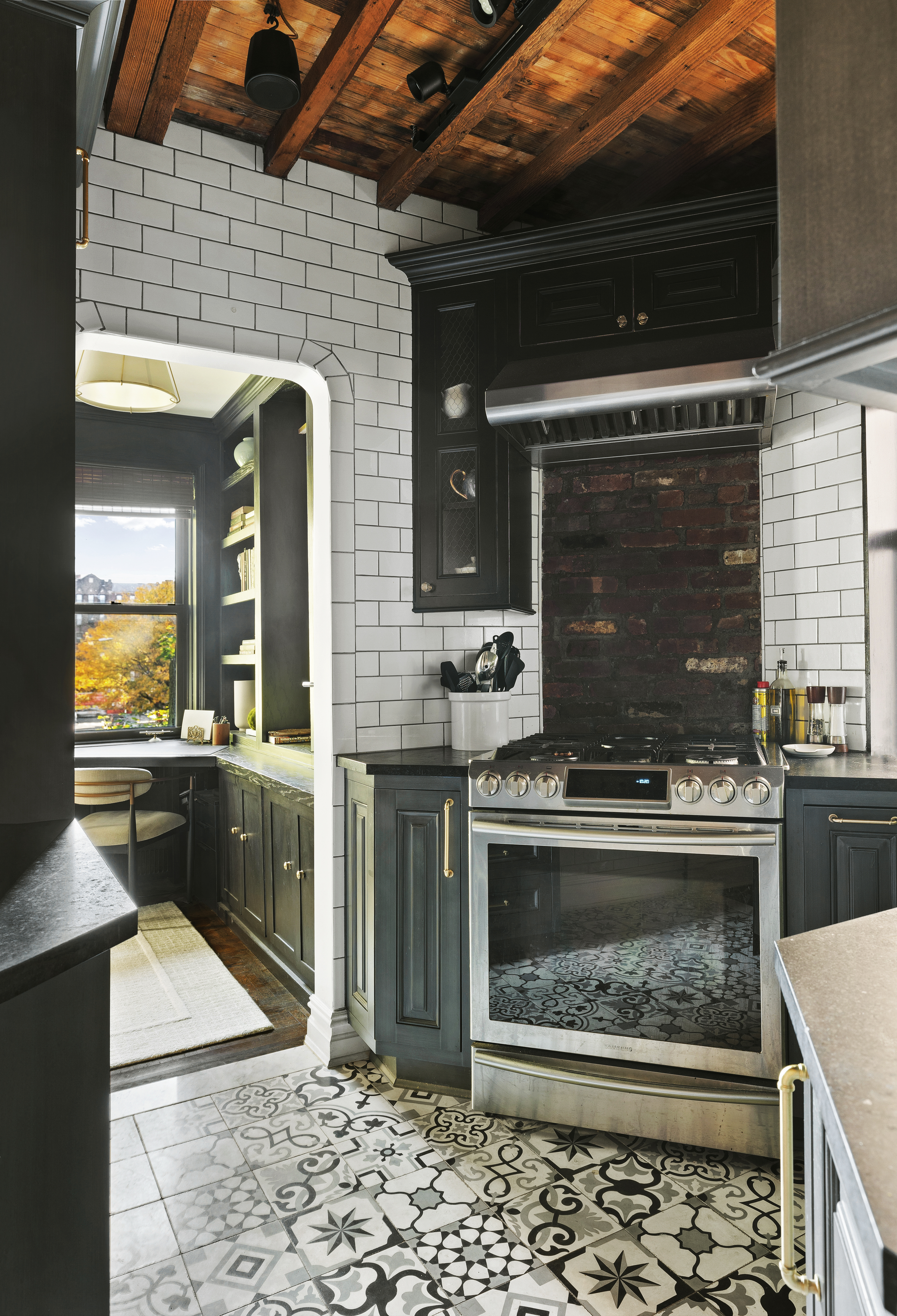 125 Ocean Avenue, Unit 2G Brooklyn, NY 11225 - Photo 8 of 16 a kitchen with a stove and a microwave