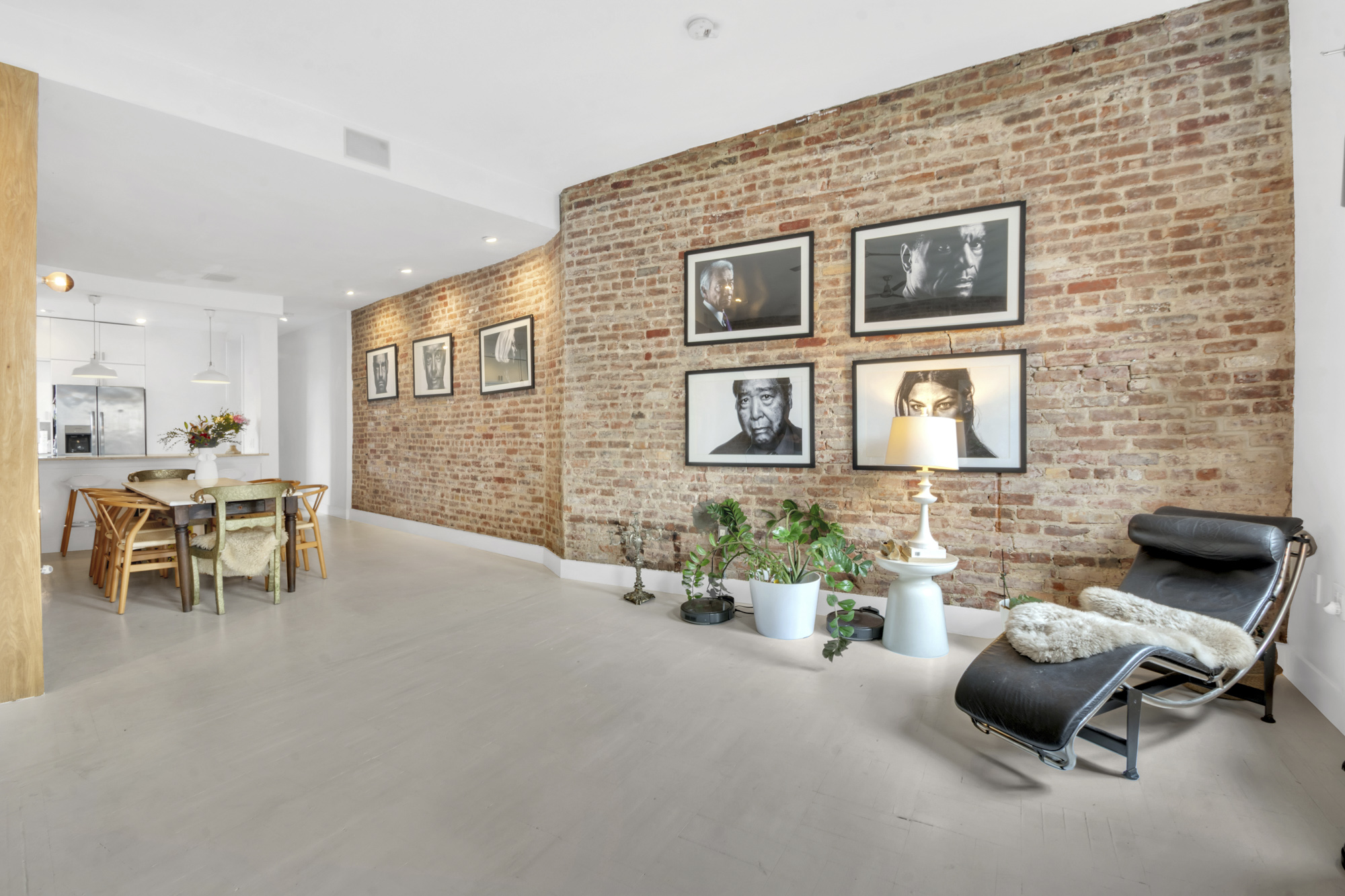 47 Fort Washington Avenue, Unit 61 Manhattan, NY 10032 - Photo 4 of 14 a living room with furniture and flowers