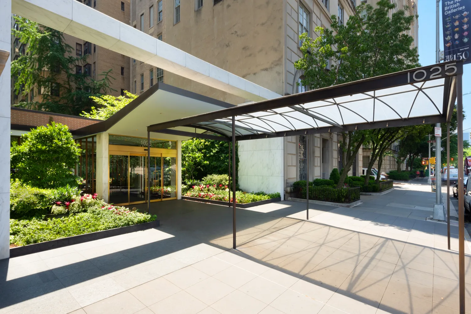 a view of a house with sitting area and garden