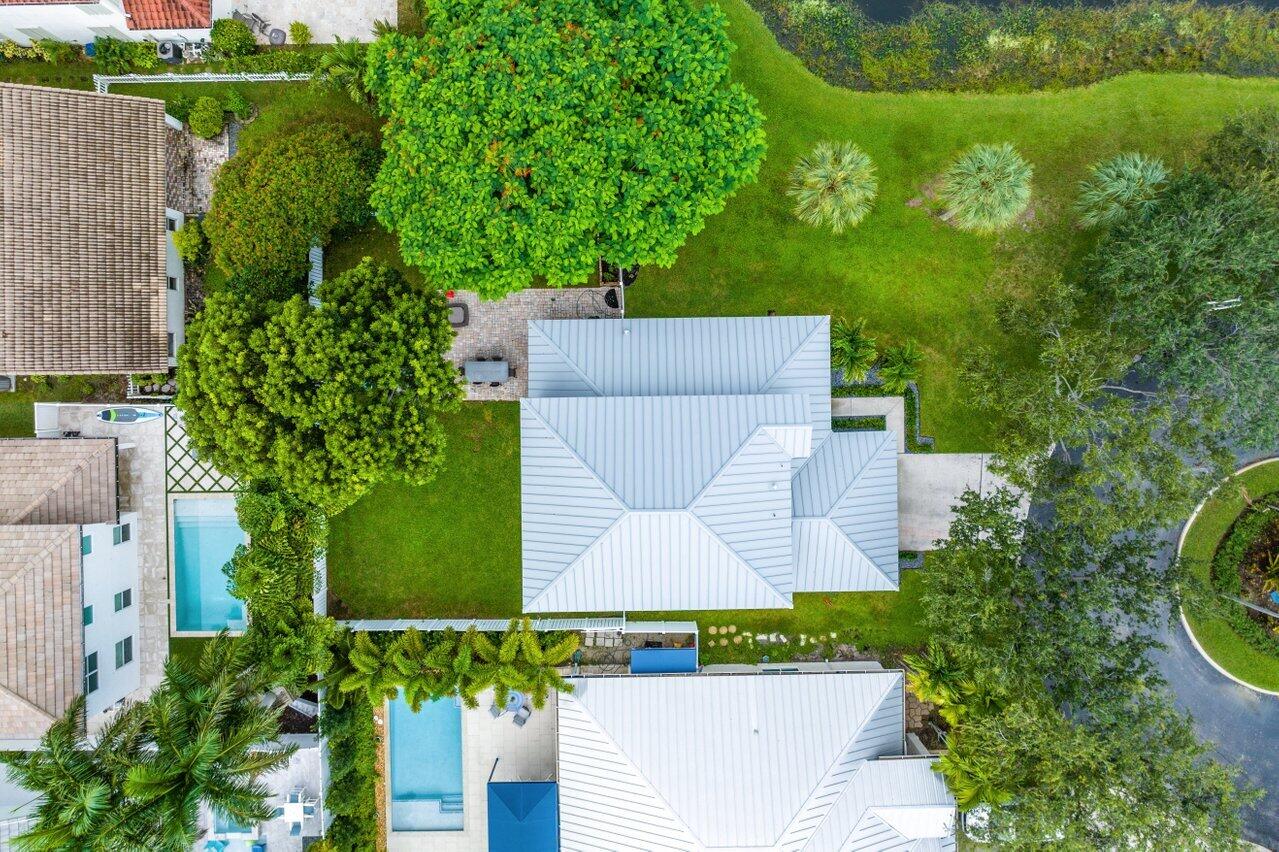 1182 Canoe Point Delray Beach, FL 33444 - Photo 35 of 46 an aerial view of a house with a garden