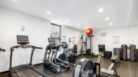 a view of a room with gym equipment