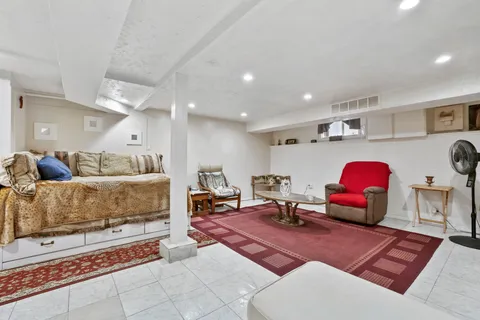 a living room with furniture and a couch