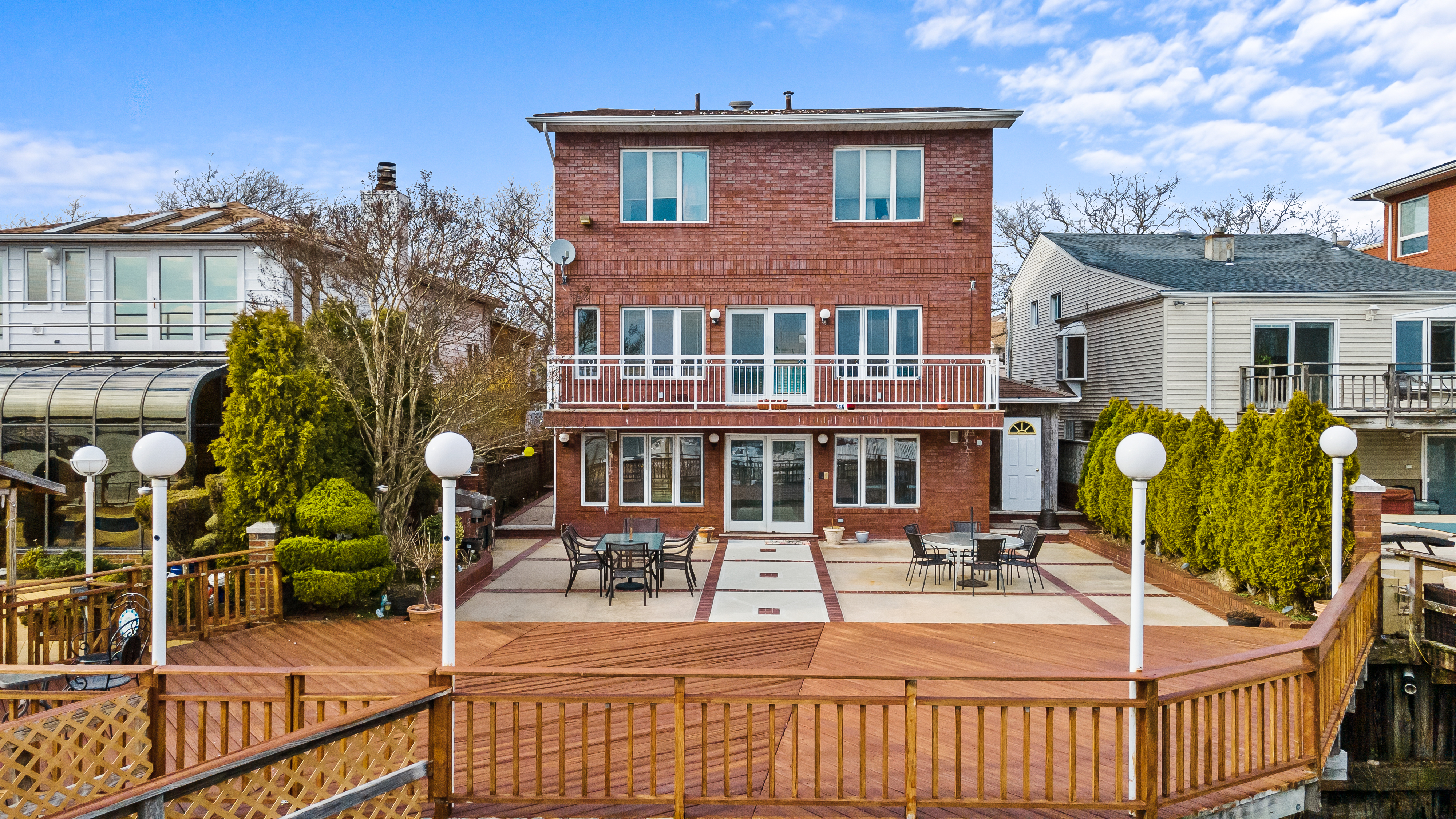 303 Whitman Drive Brooklyn, NY 11234 - Photo 6 of 37 a view of a house with outdoor seating area