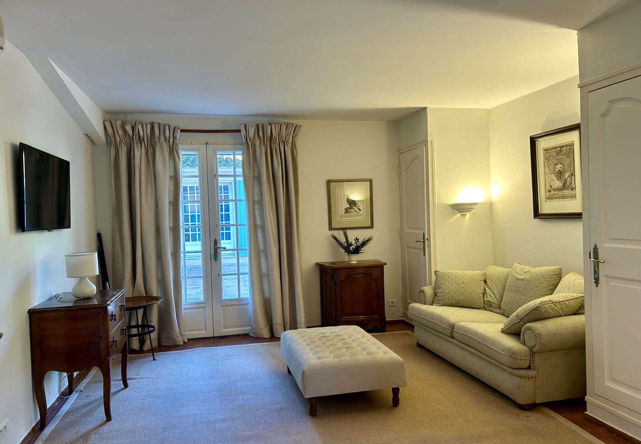 Le Vieux Moulin Provence-Alpes-Côte d’Azur, undefined 83630 - Photo 19 of 21 a living room with furniture and a flat screen tv