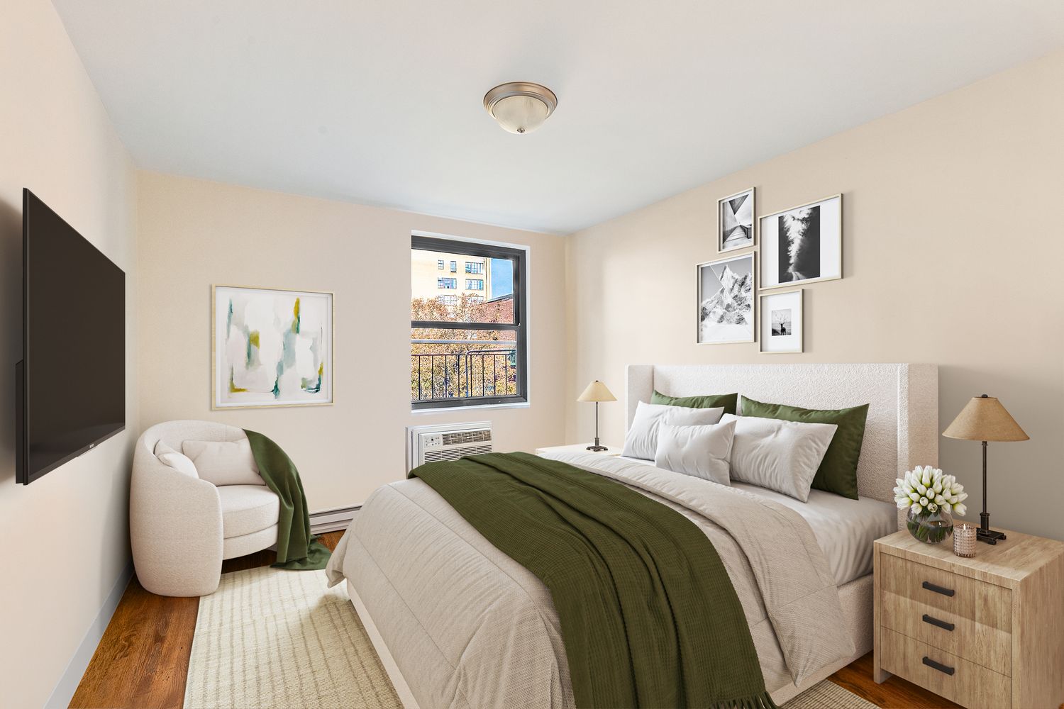 a bedroom with a bed and wooden floor