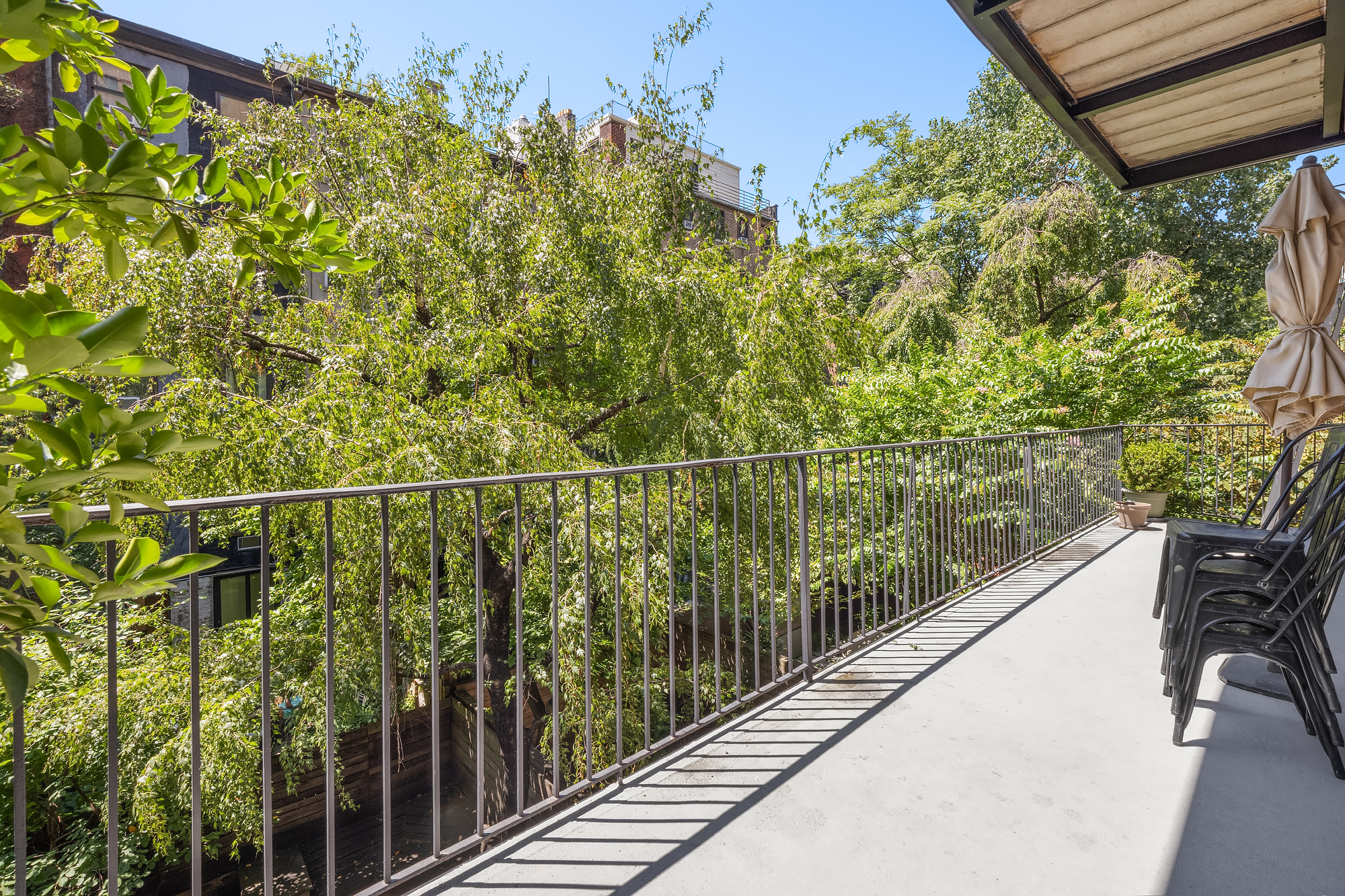 430 West 23rd Street, Unit C Manhattan, NY 10011 - Photo 4 of 16 a view of a balcony with mountain view