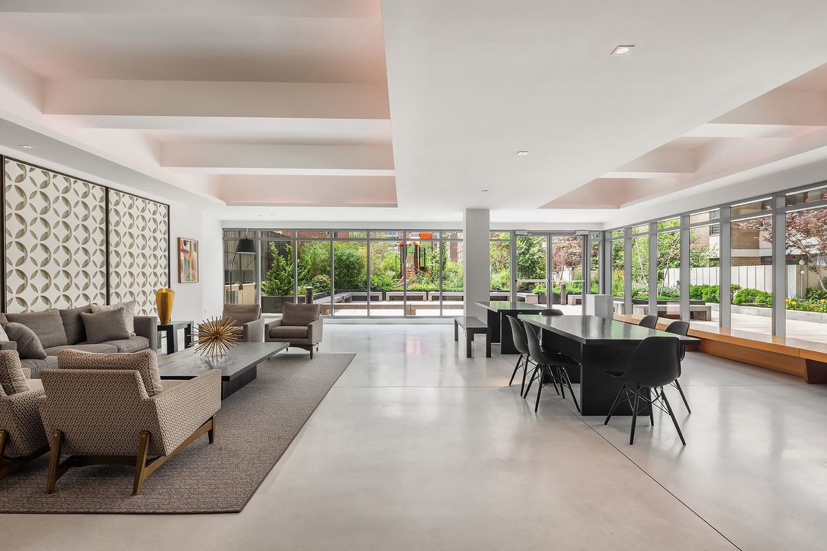175 West 95th Street, Unit 19F Manhattan, NY 10025 - Photo 14 of 16 a living room with furniture and a large window