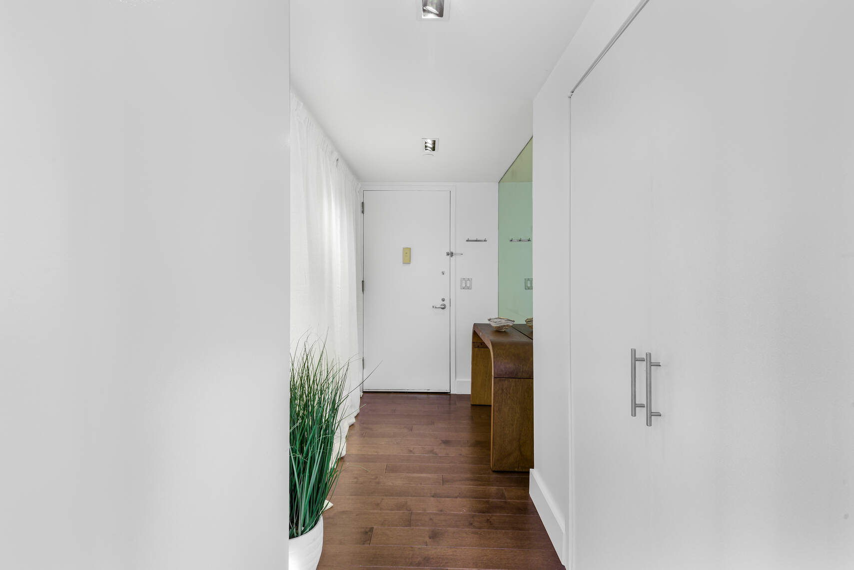 520 West 23rd Street, Unit PH16F Manhattan, NY 10011 - Photo 8 of 17 a view of a hallway with a white walls