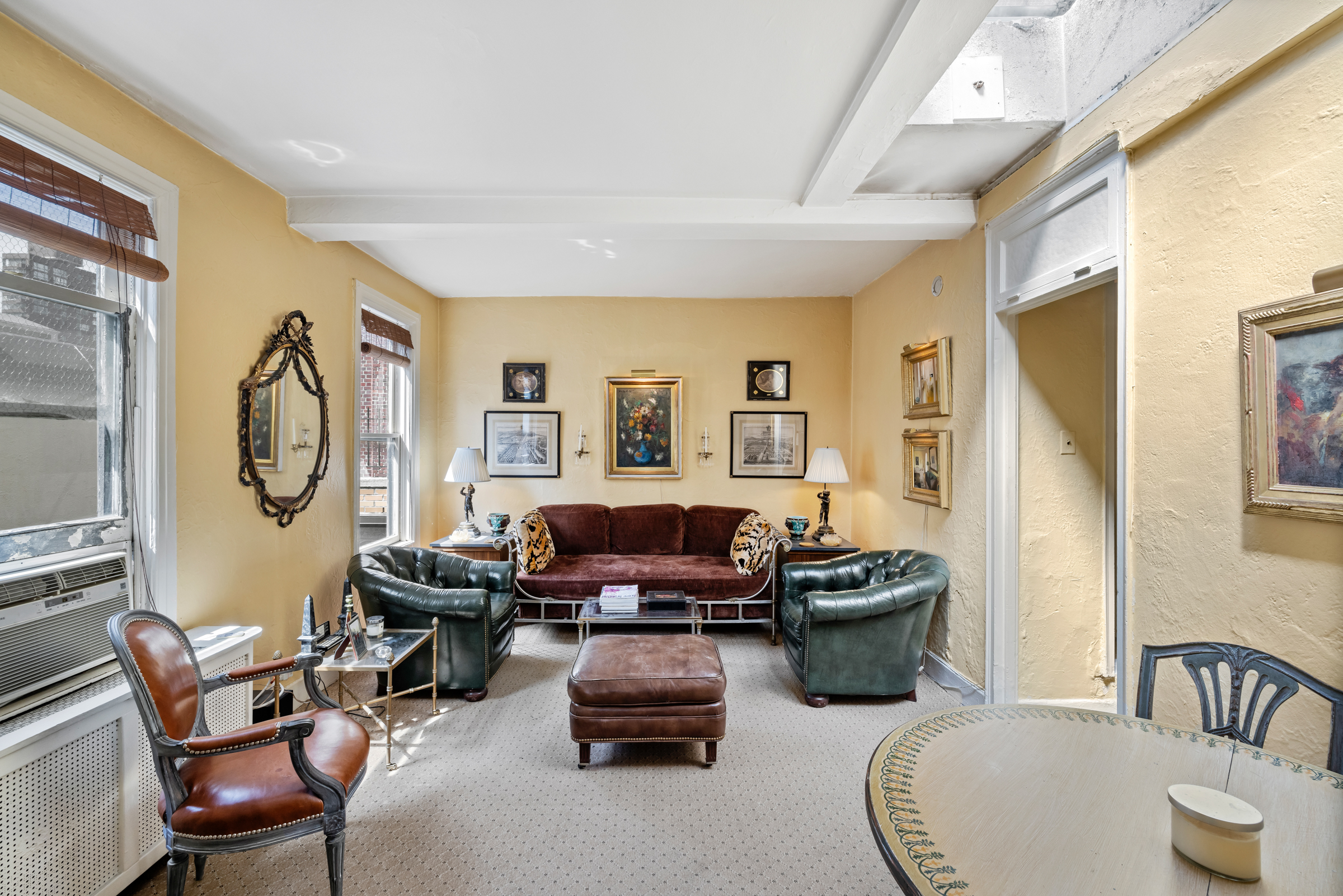 105 East 38th Street, Unit PH10 Manhattan, NY 10016 - Photo 6 of 11 a bedroom with furniture and a window