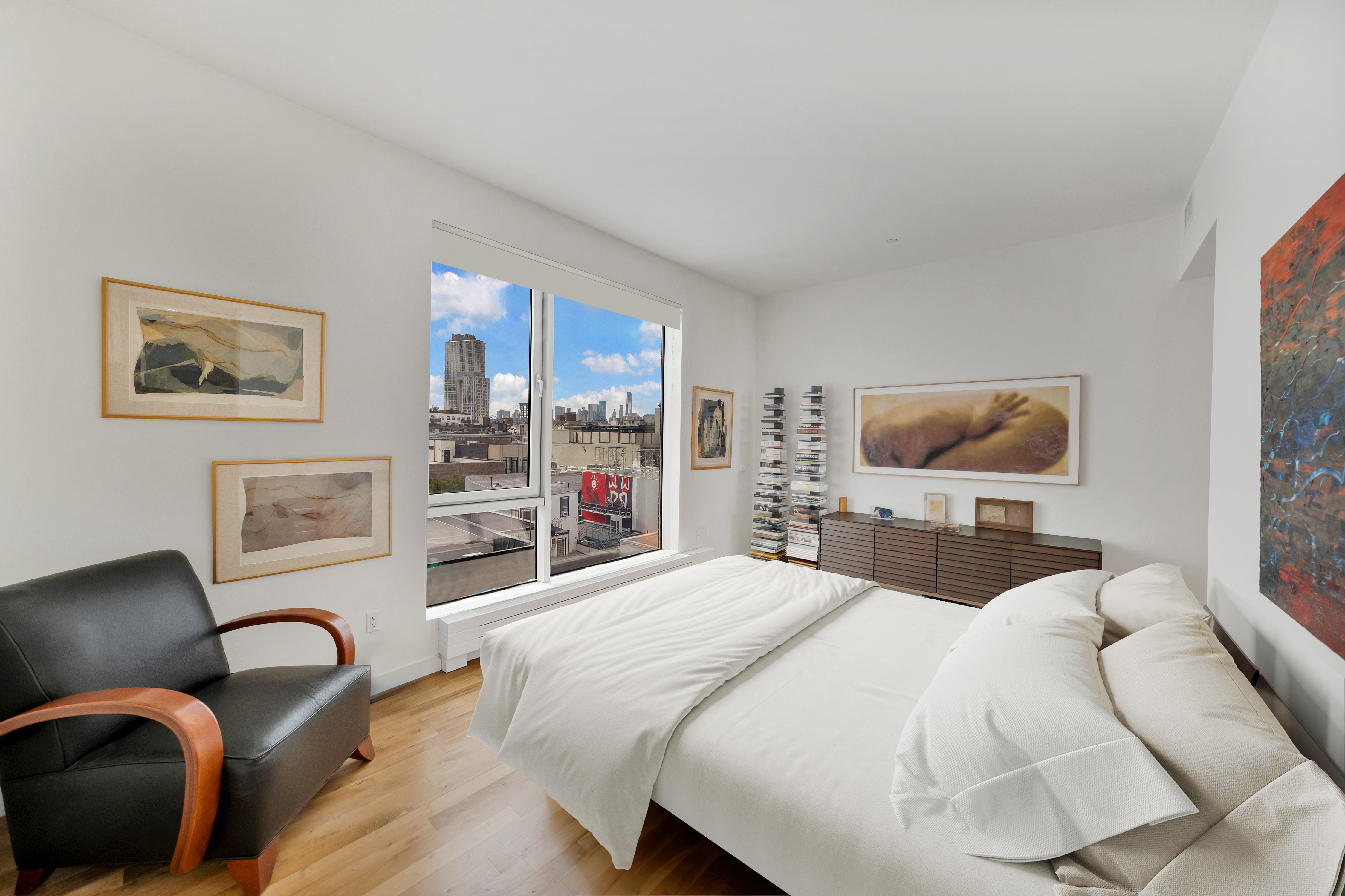 120 North 7th Street, Unit PH4B Brooklyn, NY 11249 - Photo 8 of 13 a bedroom with a bed and lamp