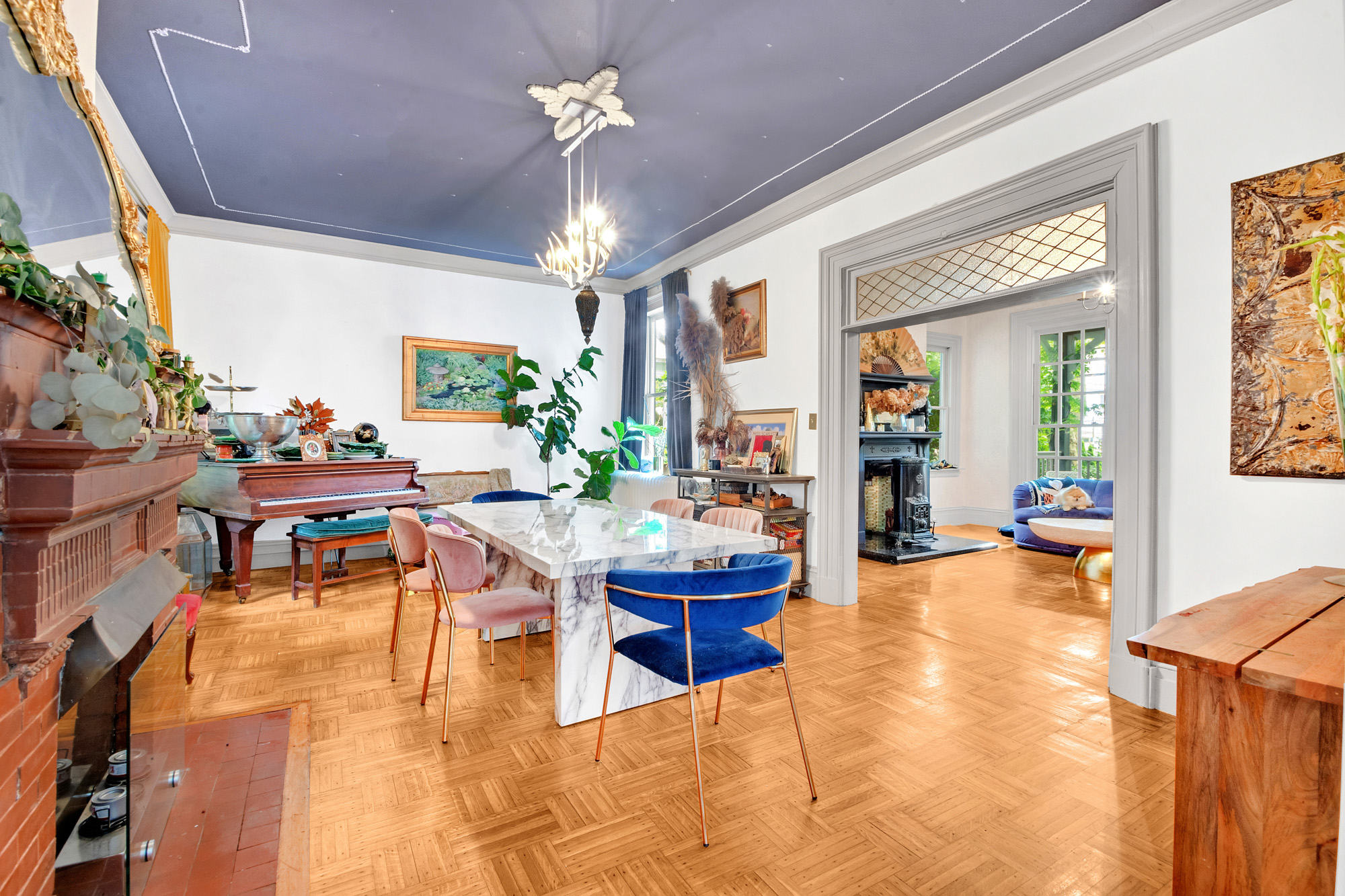 117 Tysen Street Staten Island, NY 10301 - Photo 2 of 19 a living room with furniture and a chandelier
