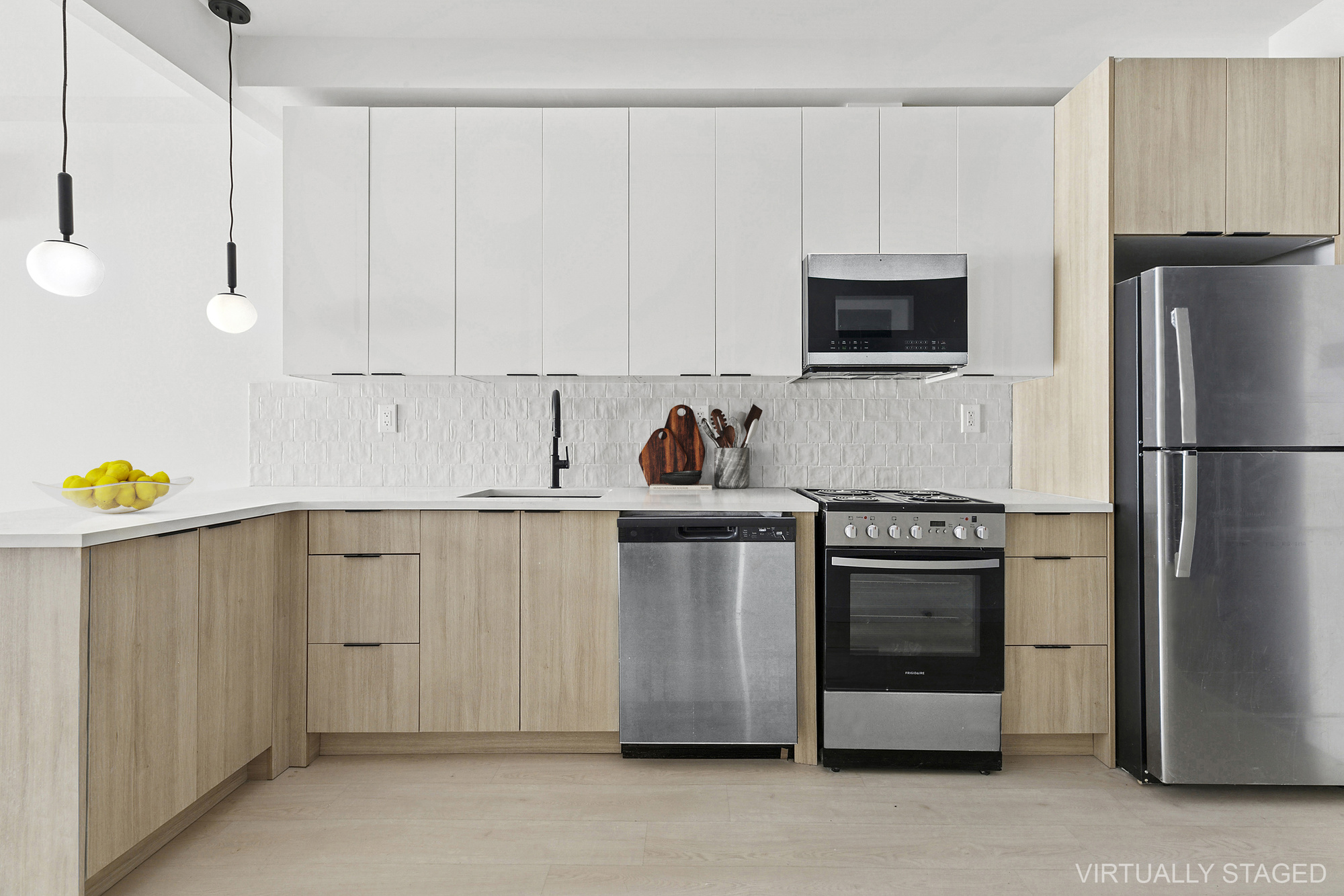 647 Dekalb Avenue, Unit 1B Brooklyn, NY 11216 - Photo 5 of 9 a kitchen with stainless steel appliances granite countertop a refrigerator stove and microwave
