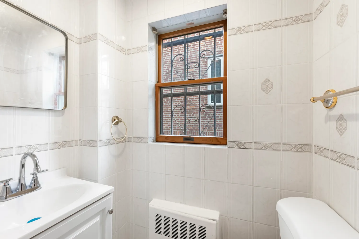 a bathroom with a sink and a toilet