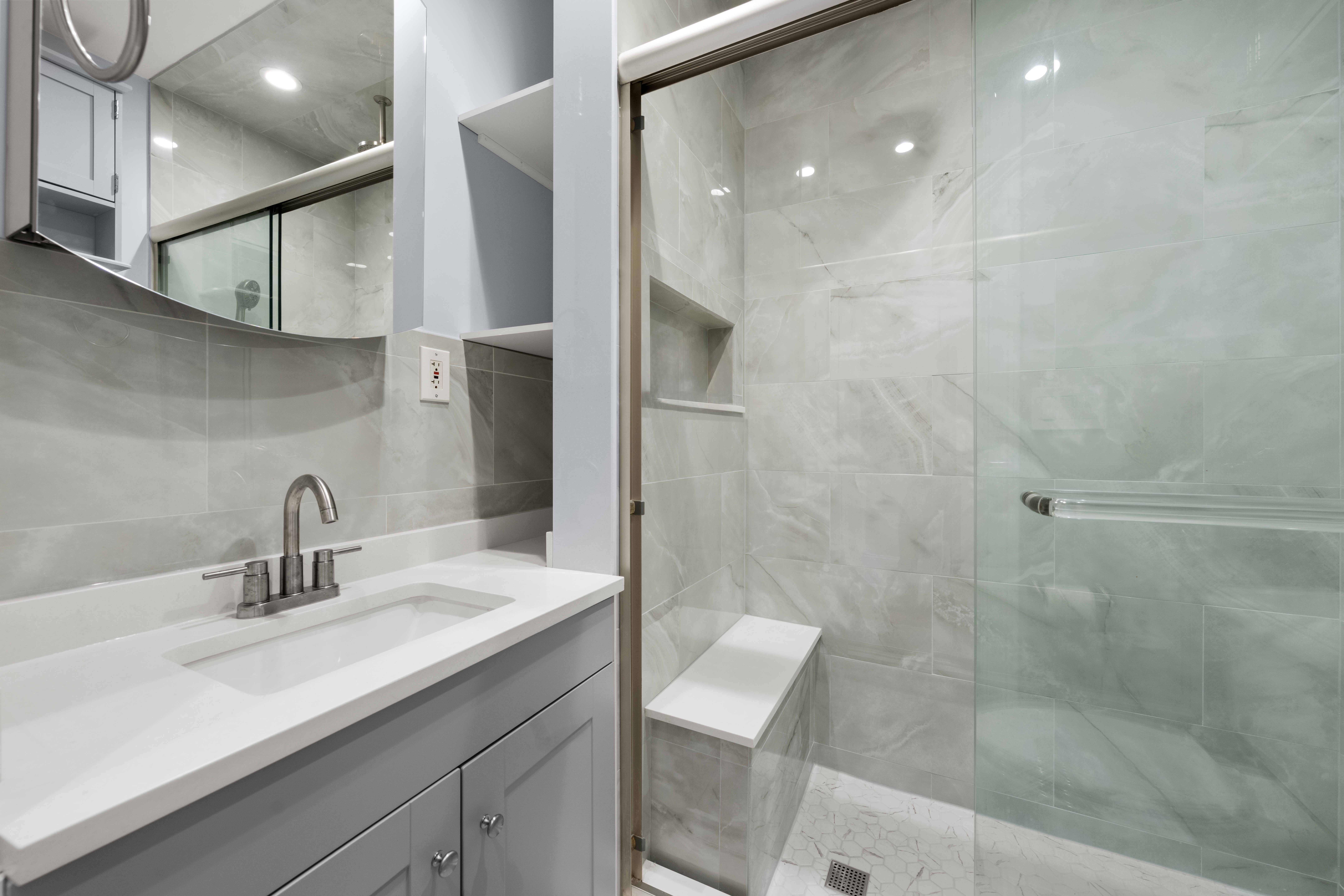 321 Commonwealth Avenue, Unit 40 Boston, MA 02115 - Photo 8 of 10 a bathroom with a sink shower and a mirror