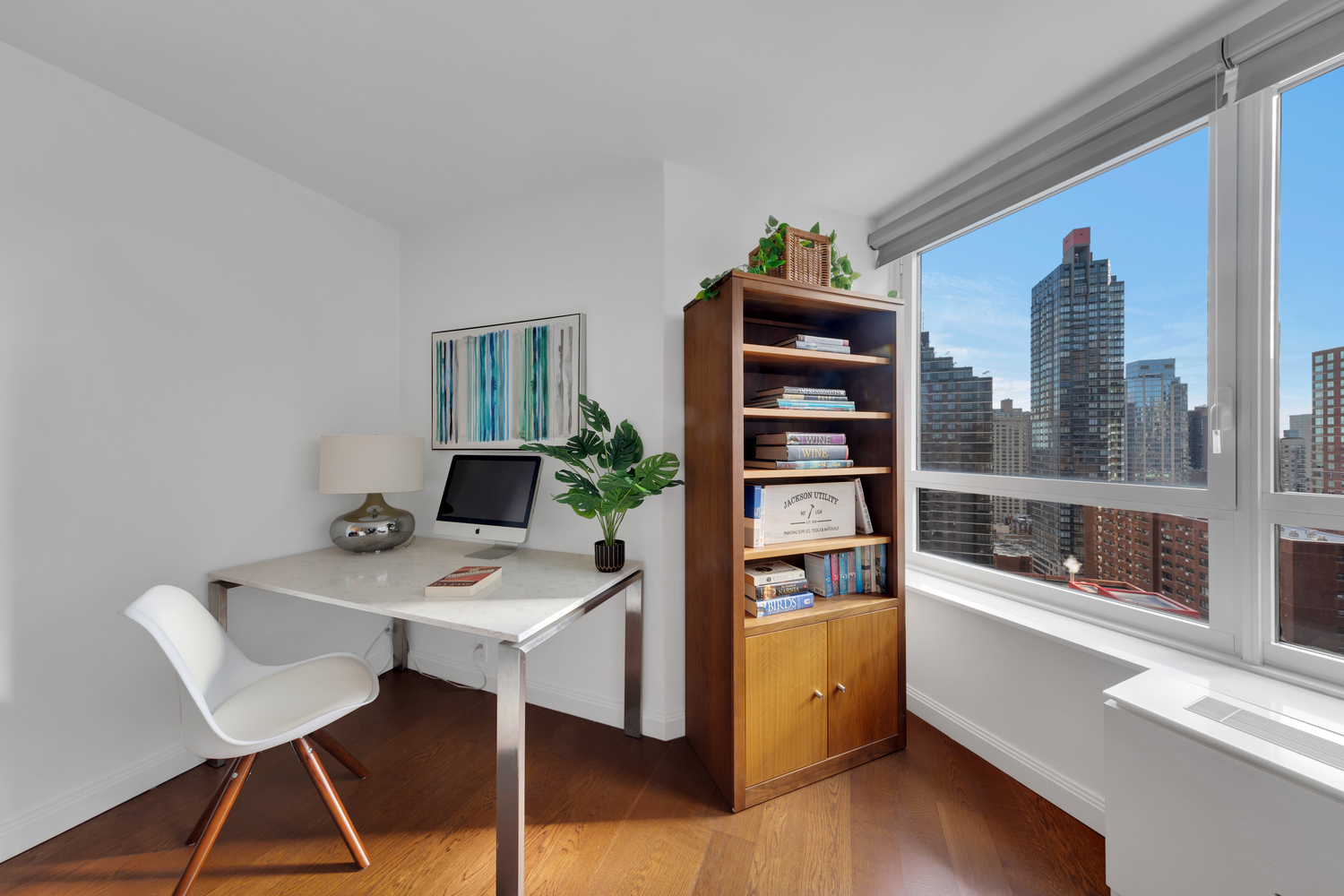 200 East 94th Street, Unit 2011 Manhattan, NY 10128 - Photo 4 of 18 a workspace with furniture and window