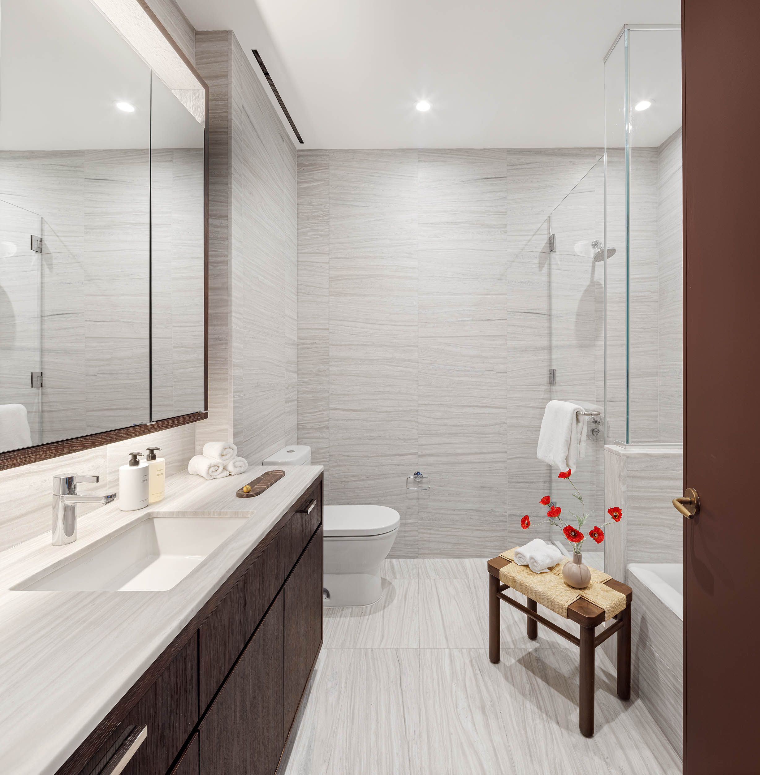 505 West 19th Street, Unit PH1 Manhattan, NY 10011 - Photo 25 of 26 a bathroom with a sink mirror and toilet