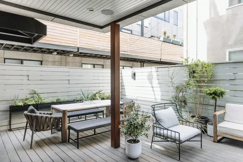 a outdoor living space with furniture