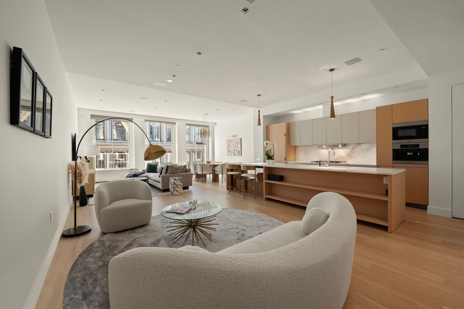 111 Mercer Street, Unit 4 Manhattan, NY 10012 - Photo 4 of 12 a living room with furniture and a view