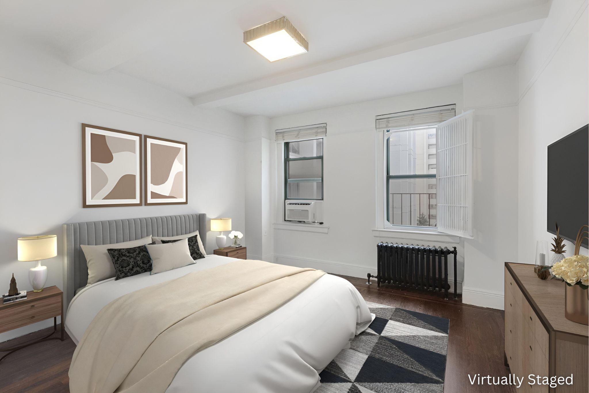65 West 95th Street, Unit 4D Manhattan, NY 10025 - Photo 4 of 11 a bedroom with a bed and a flat screen tv