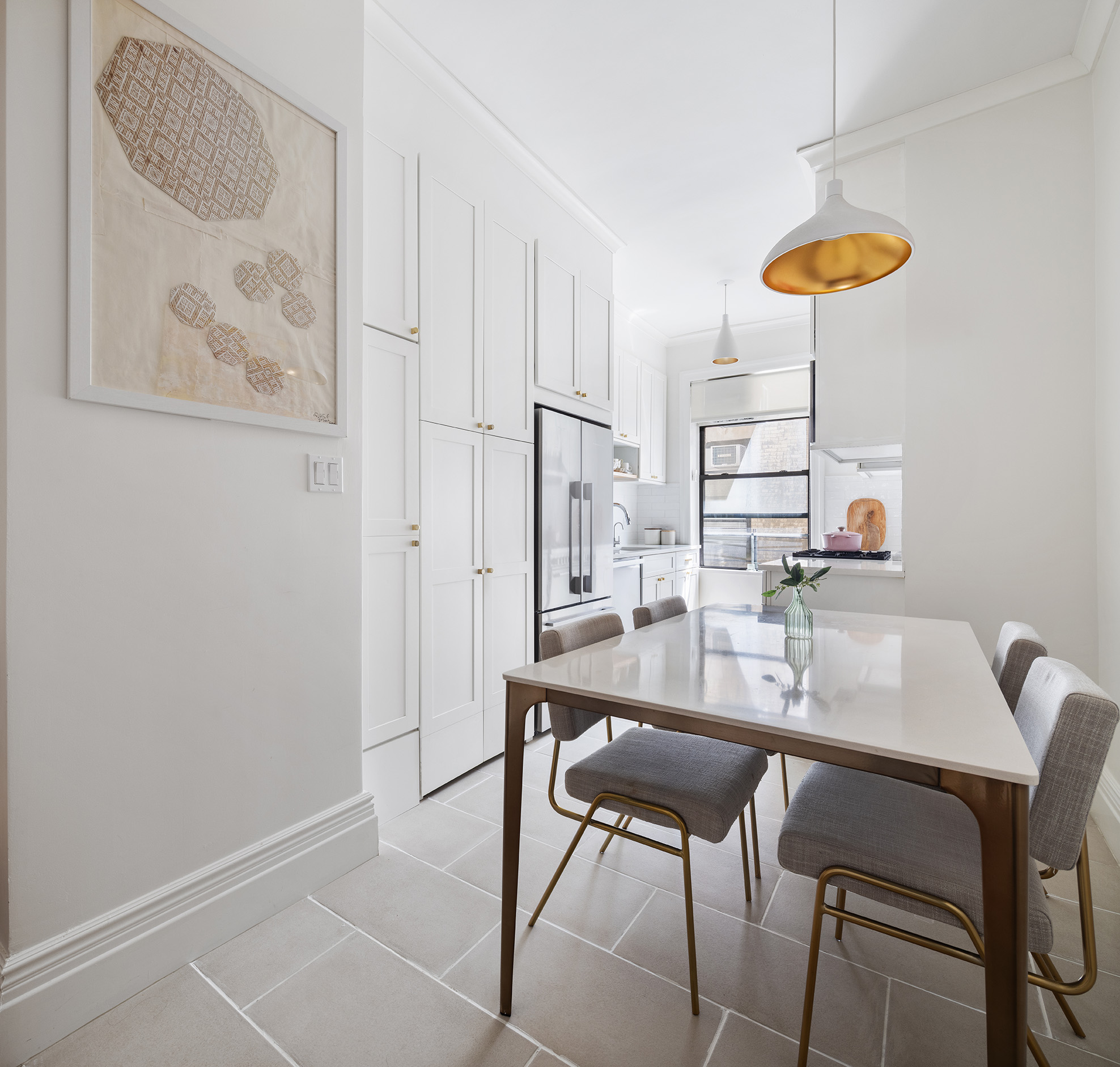 229 West 97th Street, Unit 5M New York, NY 10025 - Photo 4 of 11 a dining room with furniture and a window