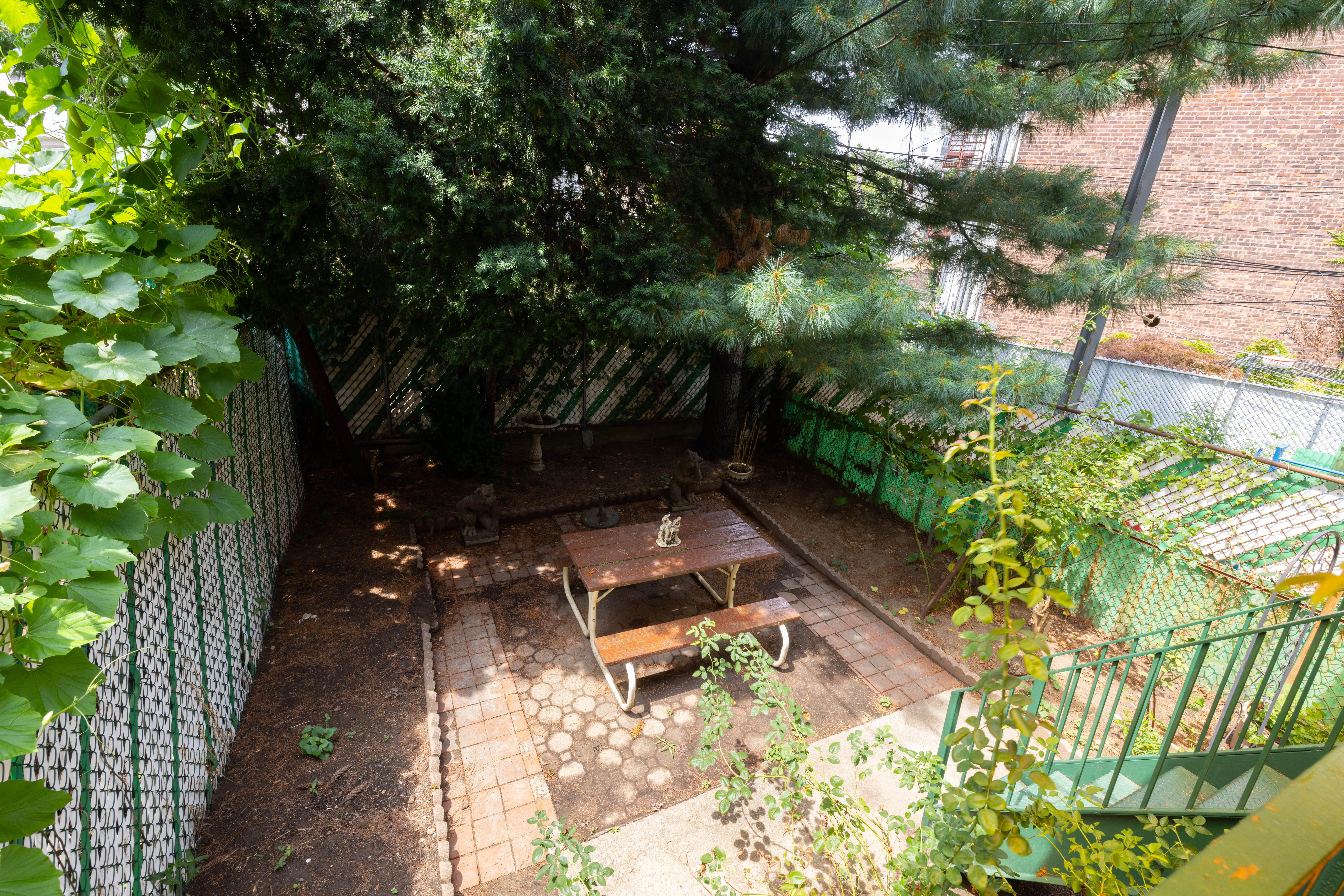 1506 Dahill Road Brooklyn, NY 11204 - Photo 12 of 13 a backyard of a house with lots of green space