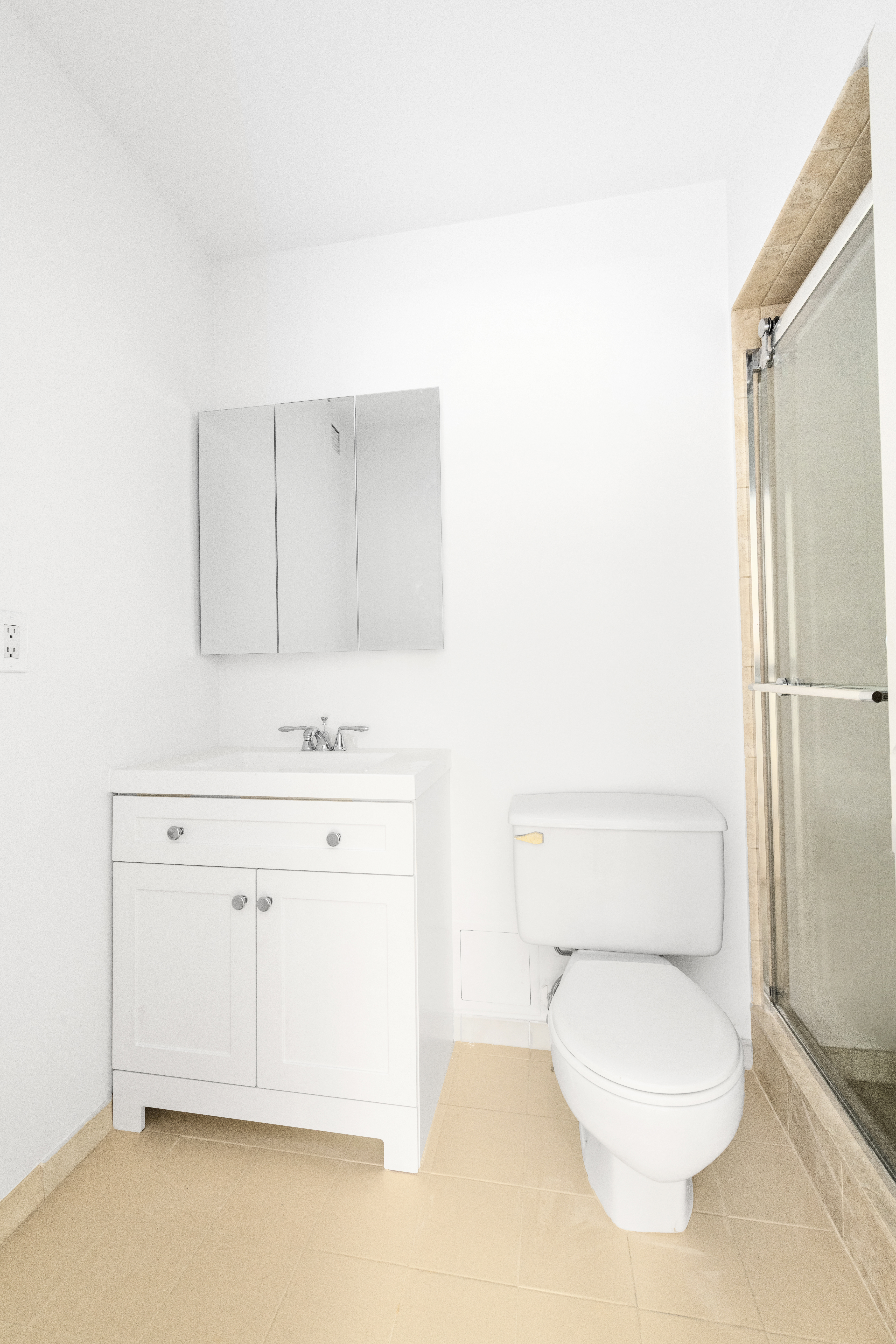 100 West 89th Street, Unit 3E Manhattan, NY 10024 - Photo 9 of 19 a bathroom with a toilet sink and shower