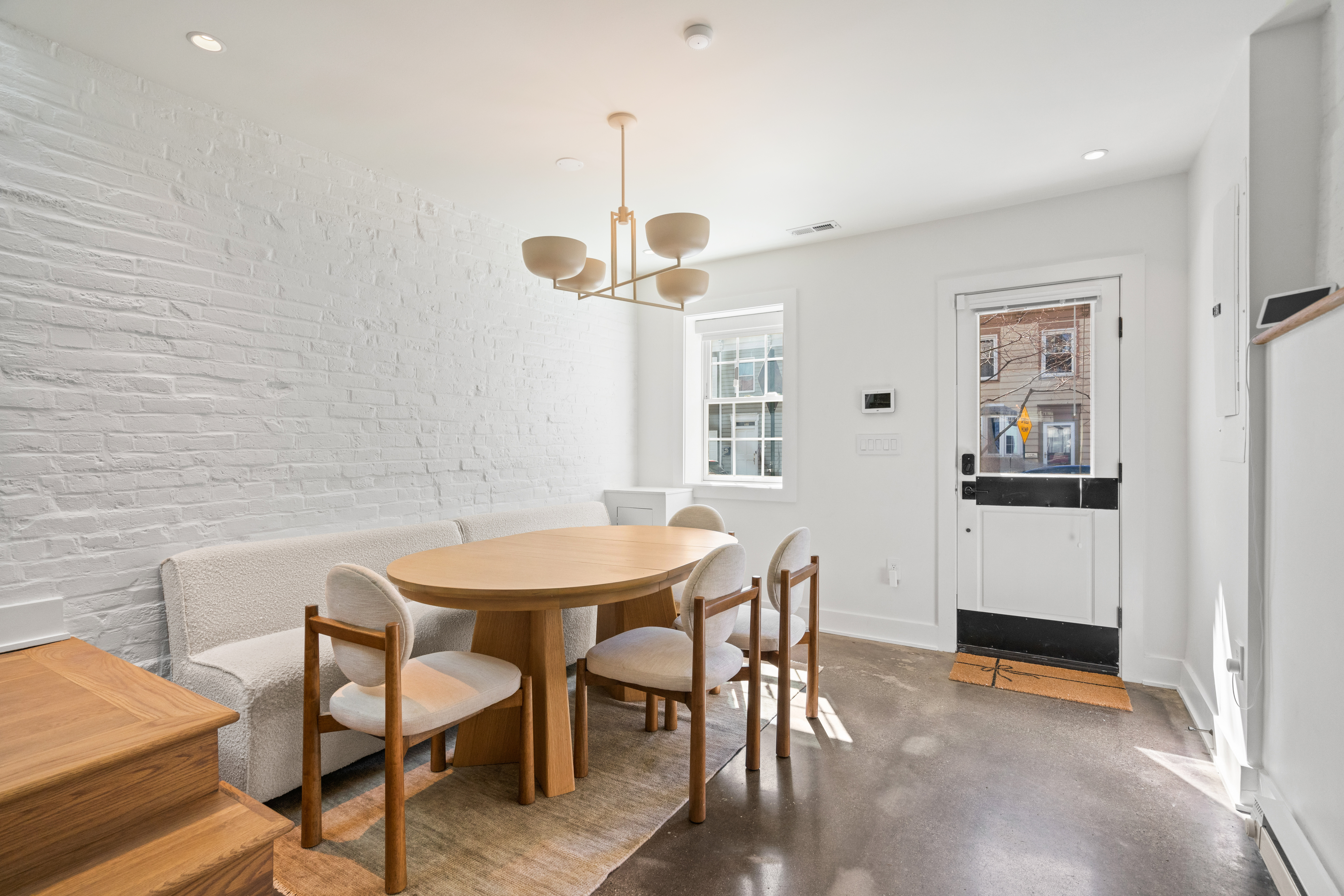 445 Ridge Street Northwest Washington, DC 20001 - Photo 5 of 43 a view of a dining room with furniture and wooden floor