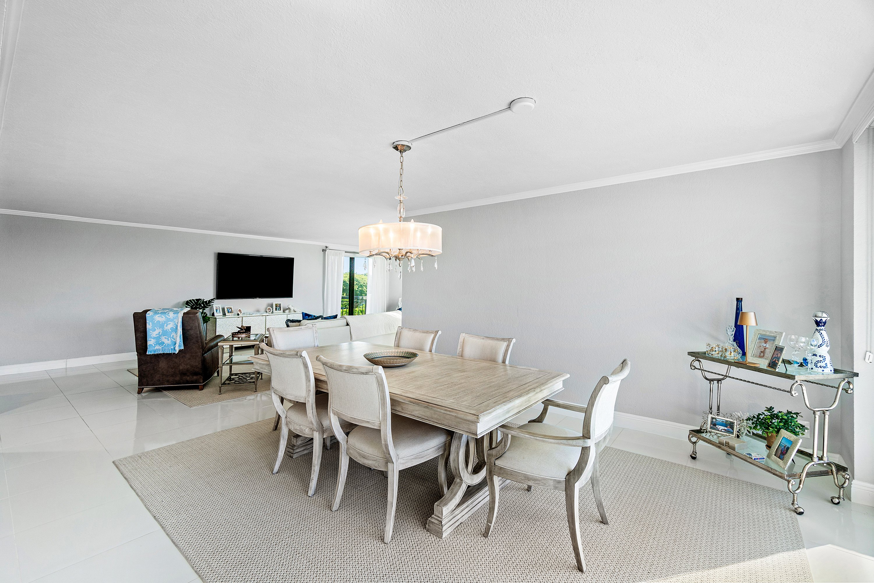 2003 North Ocean Boulevard, Unit 305 Boca Raton, FL 33431 - Photo 16 of 56 a view of a dining room with furniture