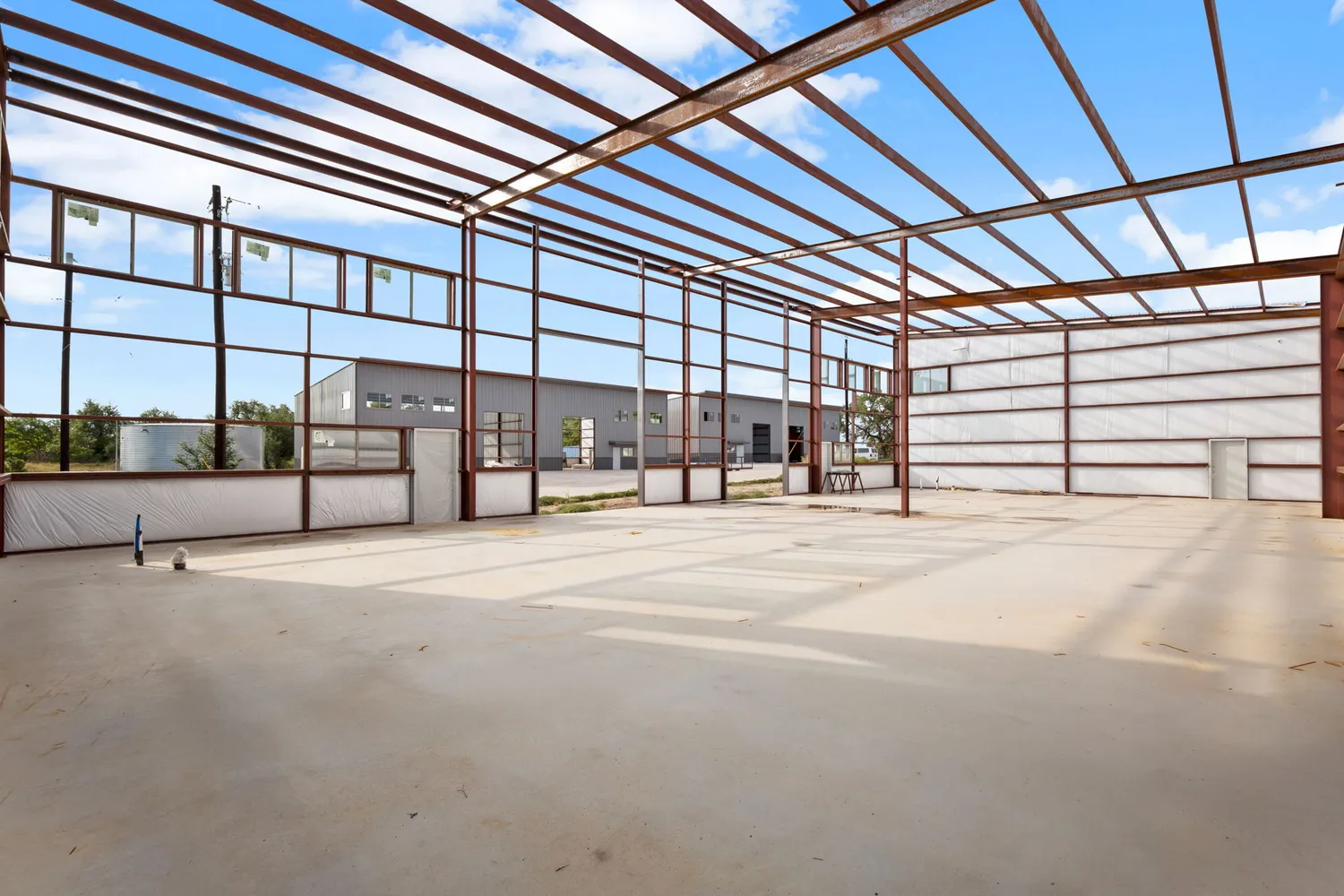 an aerial view of a house with outdoor space