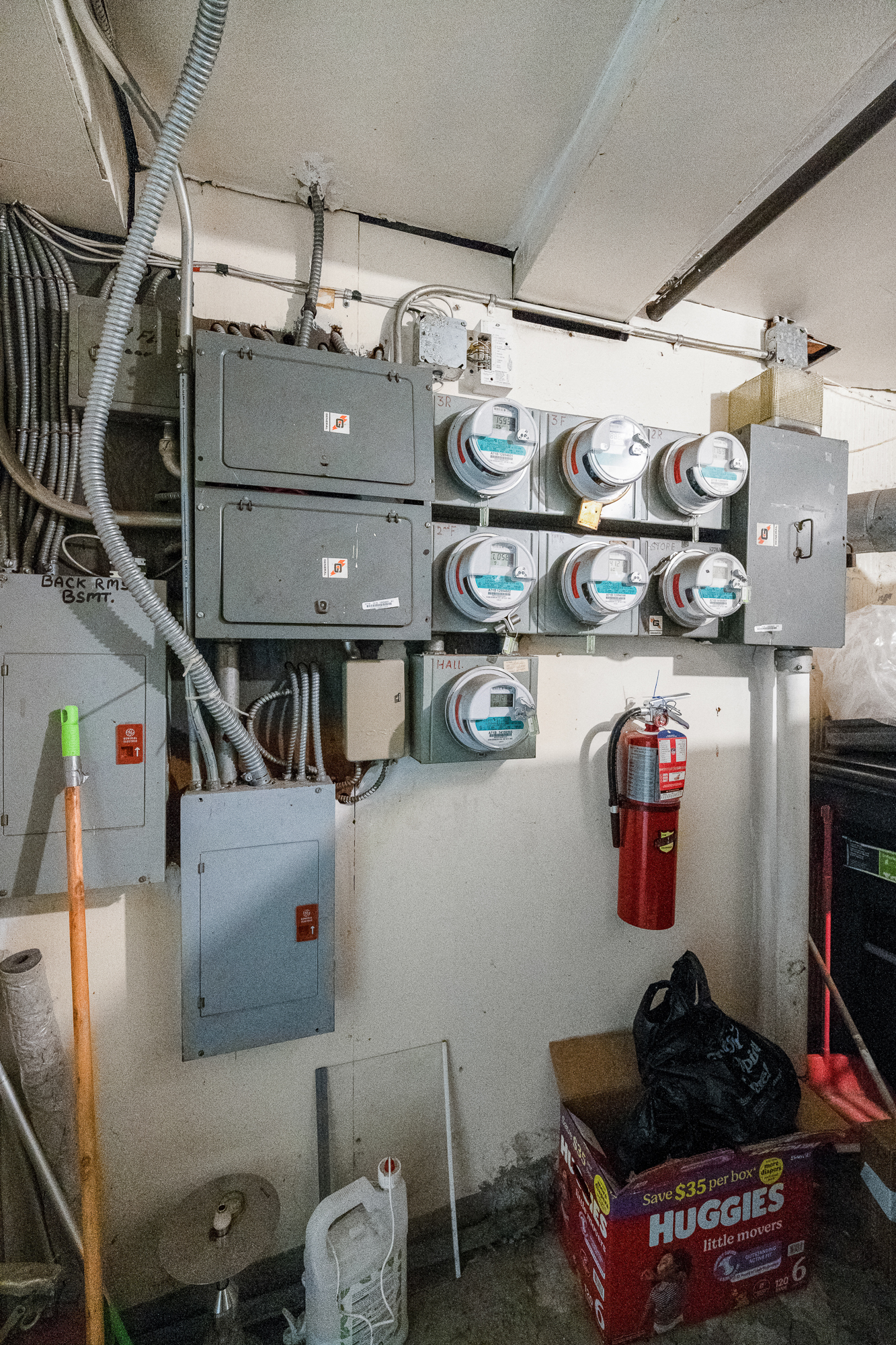 71-18 Myrtle Avenue Queens, NY 11385 - Photo 10 of 13 a room with storage and utility