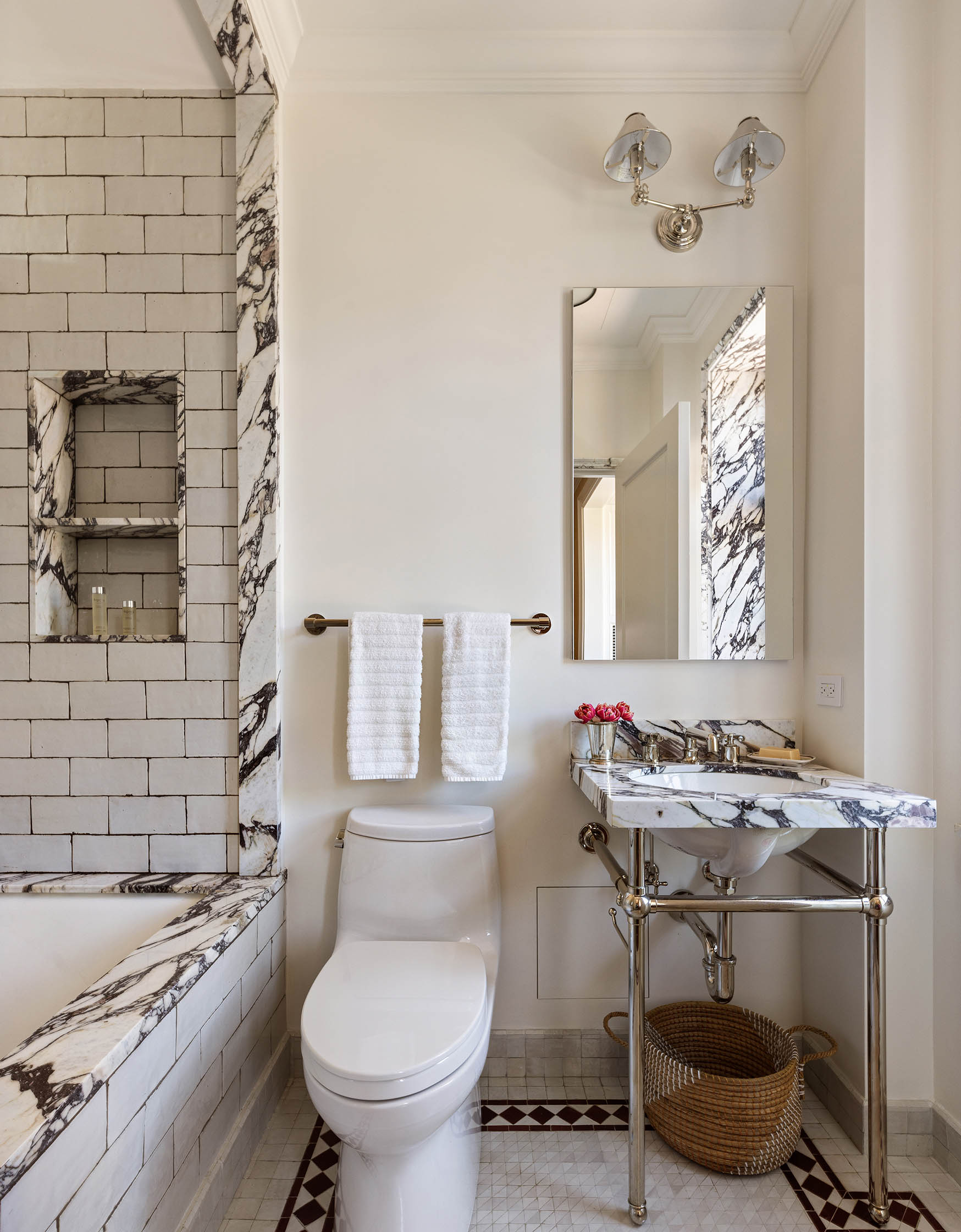 150 East 73rd Street, Unit PH Manhattan, NY 10021 - Photo 19 of 29 a bathroom with a toilet a sink and a mirror