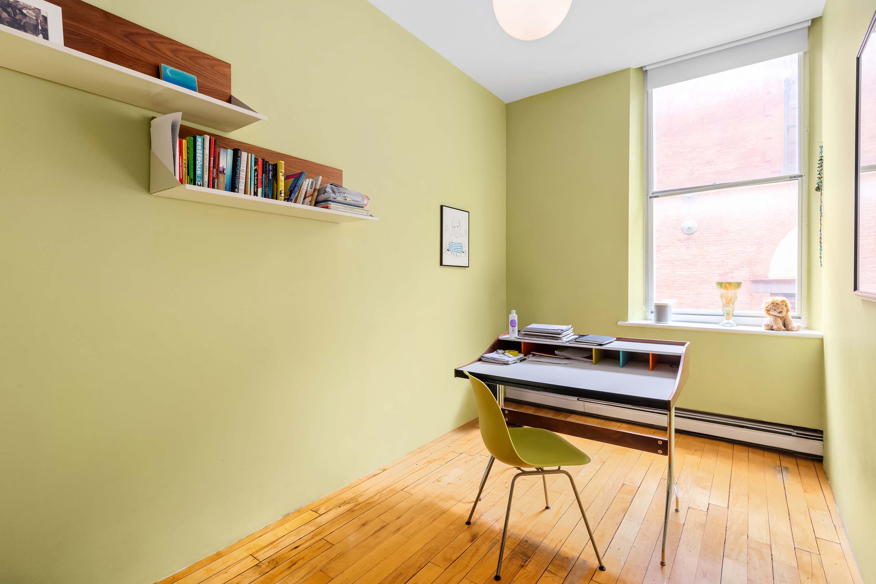 57 Laight Street, Unit 3 Manhattan, NY 10013 - Photo 12 of 15 a view of a workspace with furniture and a window