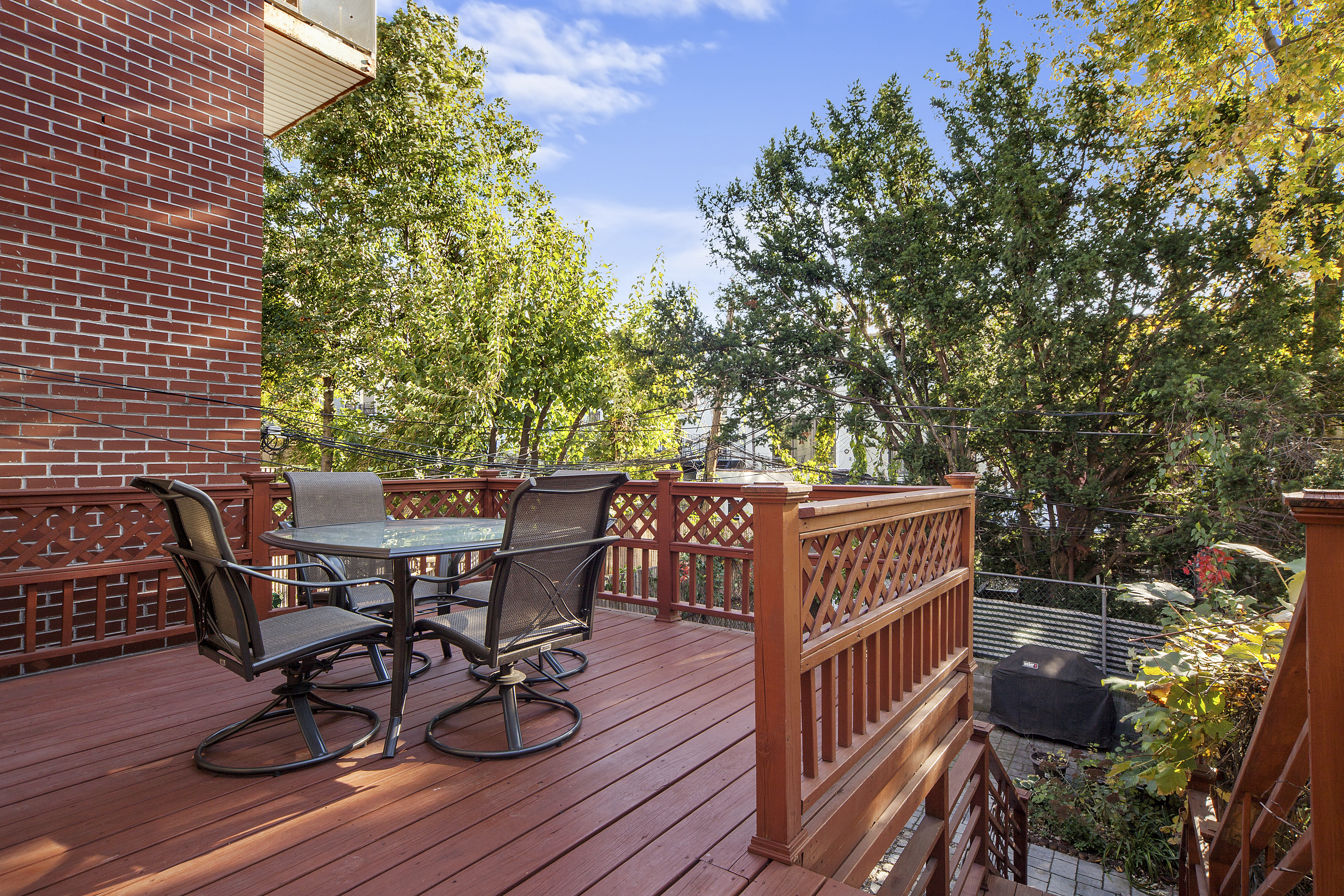 656 Union Street, Unit 2 Brooklyn, NY 11215 - Photo 6 of 12 a view of a chairs and table on the deck