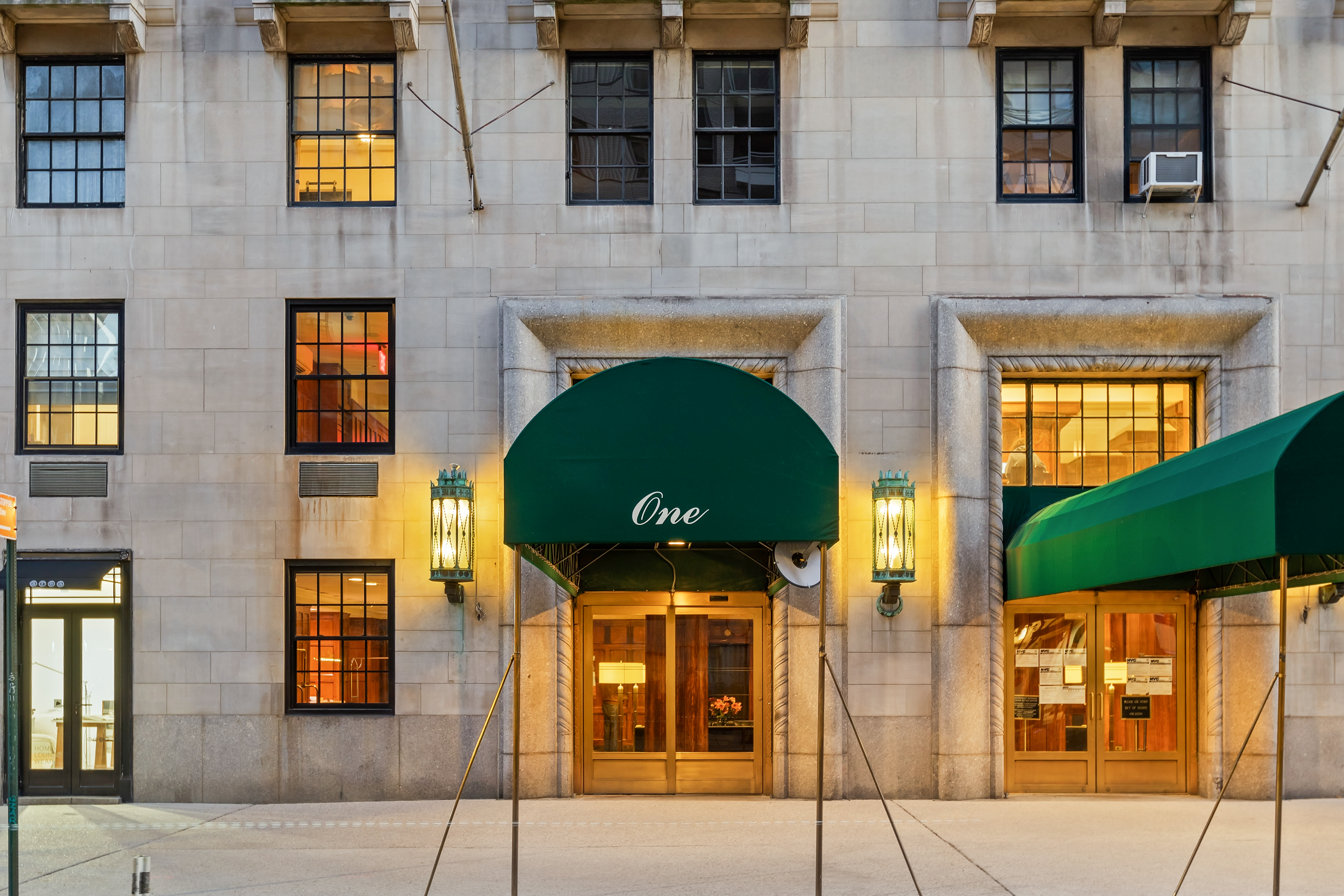 1 5th Avenue, Unit 16F Manhattan, NY 10003 - Photo 21 of 23 a front view of a house with a iron gate