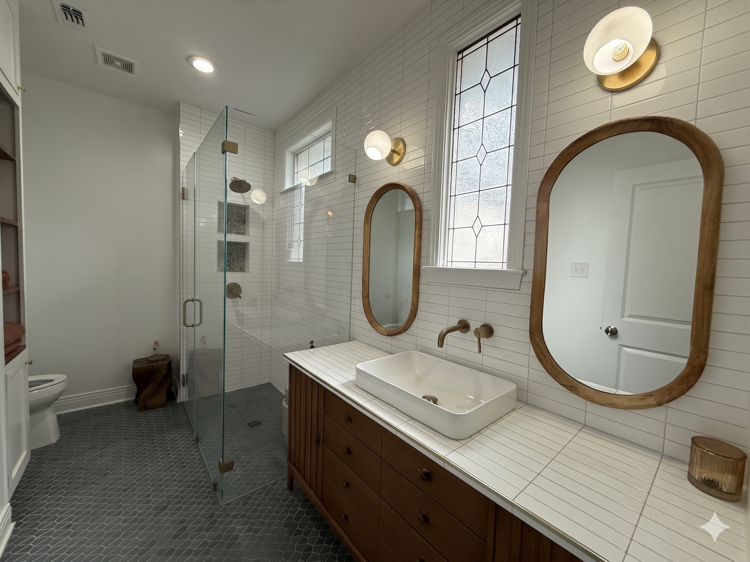 5108 Eilers Avenue Austin, TX 78751 - Photo 7 of 13 a bathroom with a granite countertop toilet sink and mirror