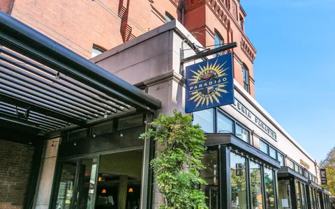 a view of a building with a street