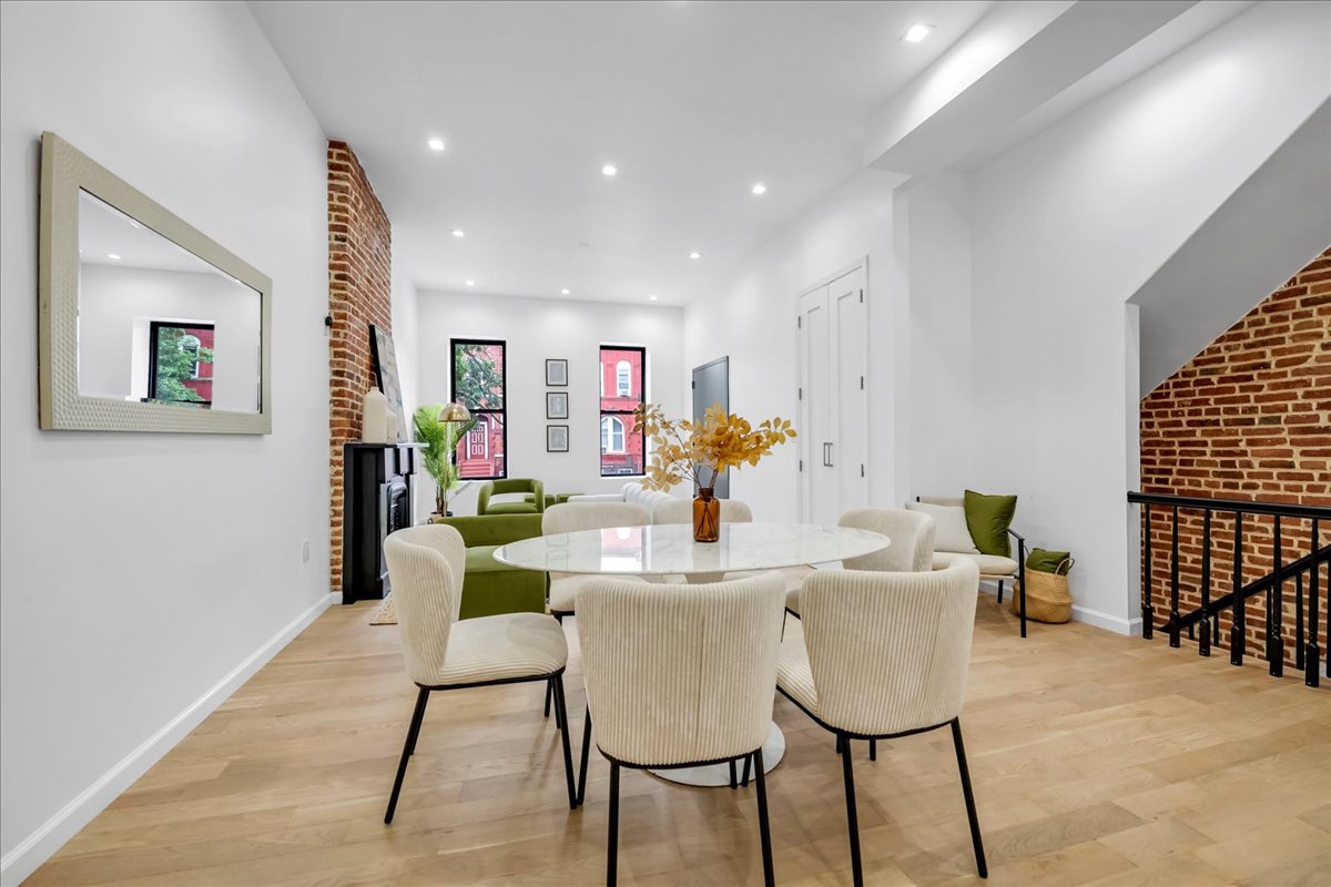 448 Halsey Street, Unit 1 Brooklyn, NY 11233 - Photo 7 of 22 a view of a dining room with furniture