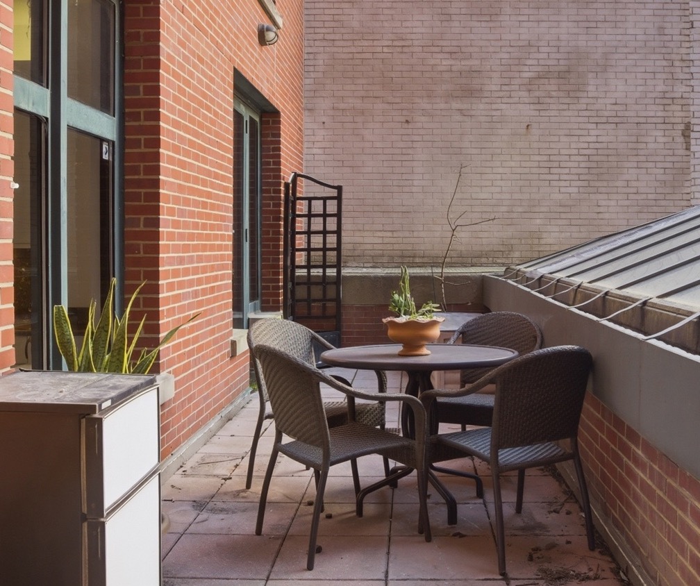 188 East 70th Street, Unit 3A Manhattan, NY 10021 - Photo 16 of 18 a view of a outdoor seating area with furniture