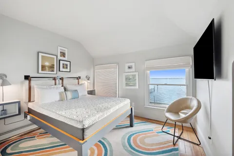 a view of a balcony with chairs